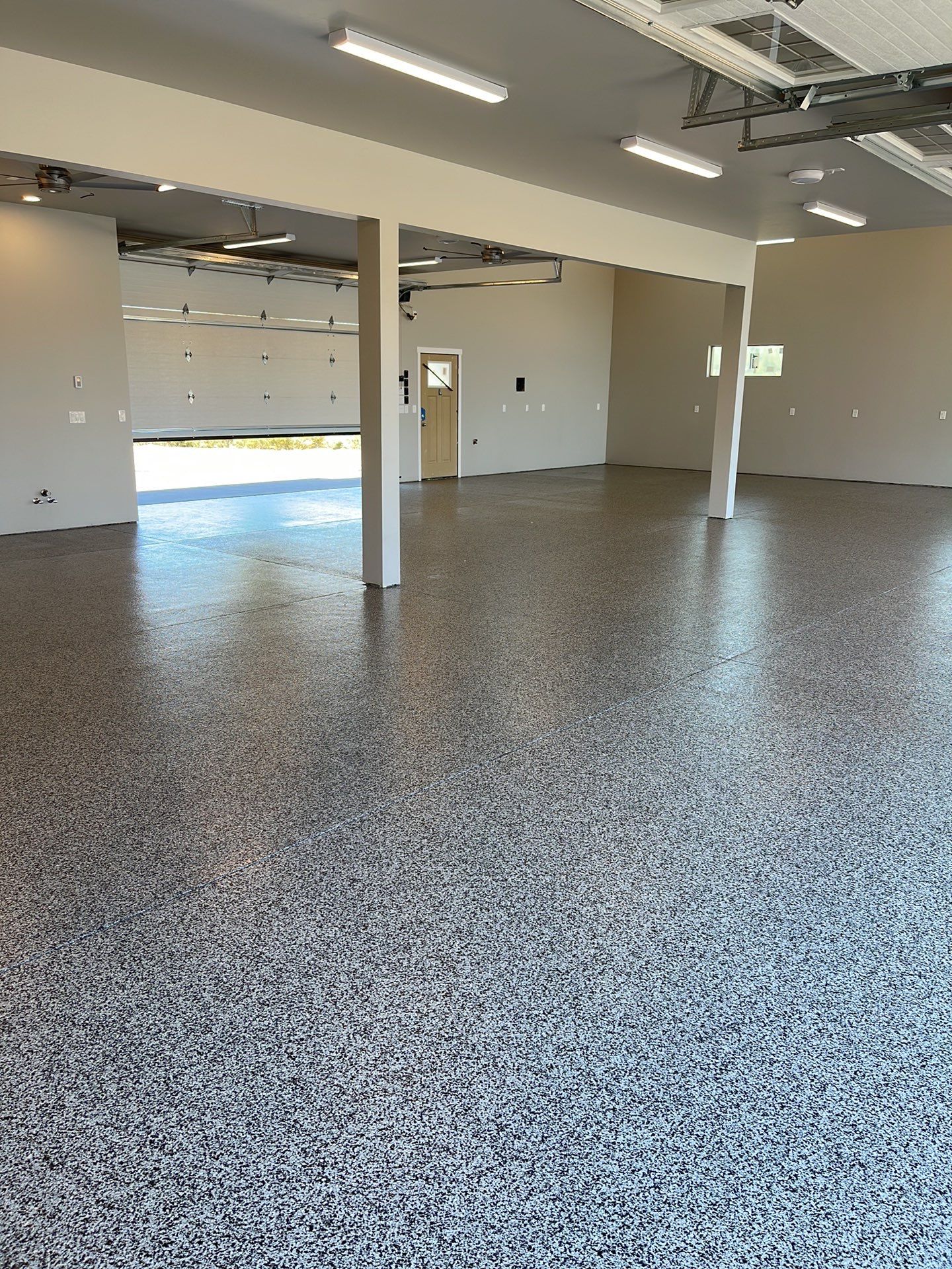 Garage Transformation using Domino by Croc Coatings, LLC