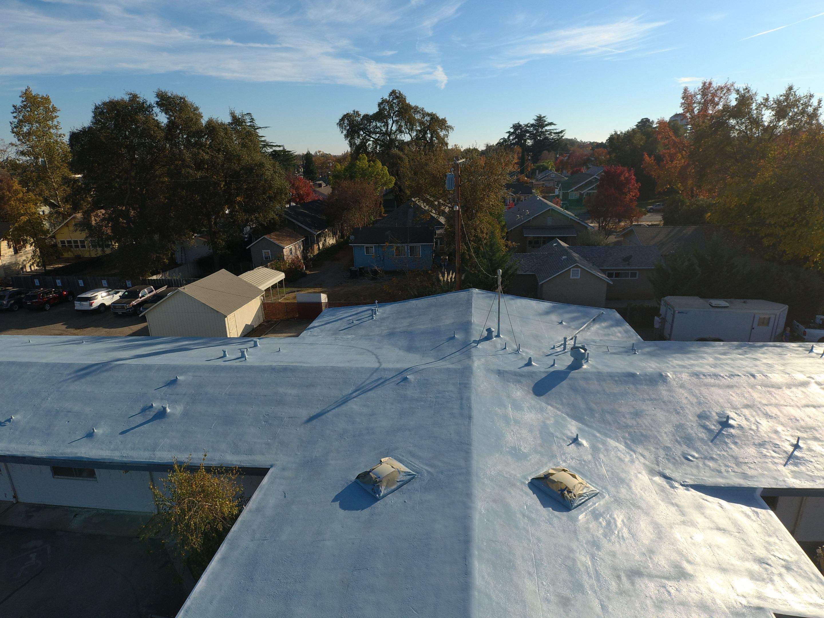 Spray foam and coatings using Conklin Benchmark/PUMA XL coatings and spray foam by Straight Edge Roofing Inc