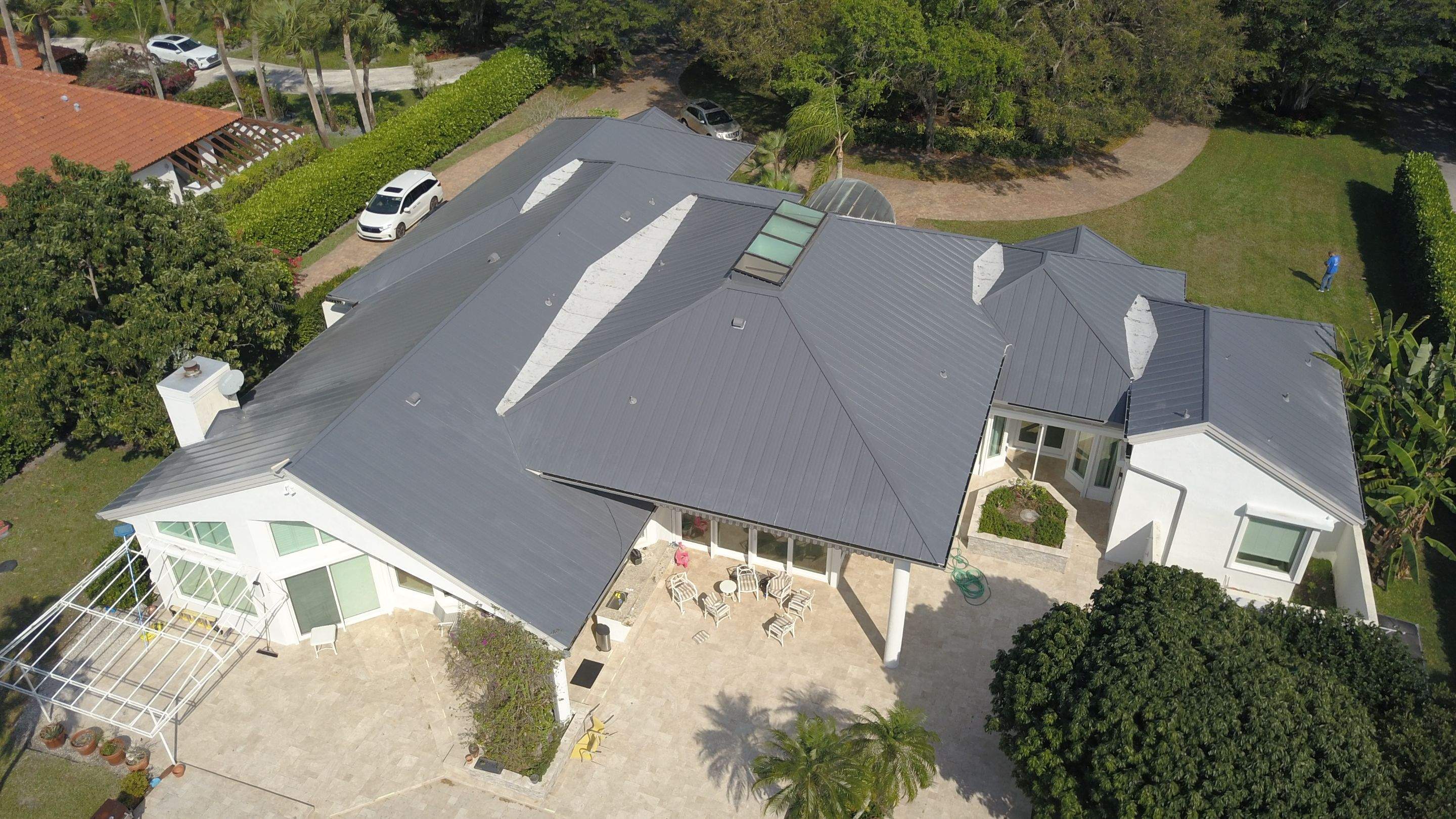 Residential Roofing Installation using 1" Nail strip metal roof by BLUES BROTHERS ROOFING