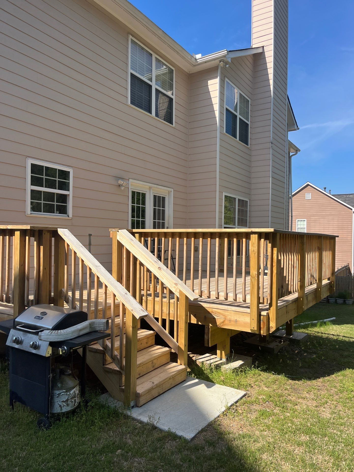 Window & Rotted Wood Replacement, Deck Stain, and Exterior Paint by Nelson Exteriors