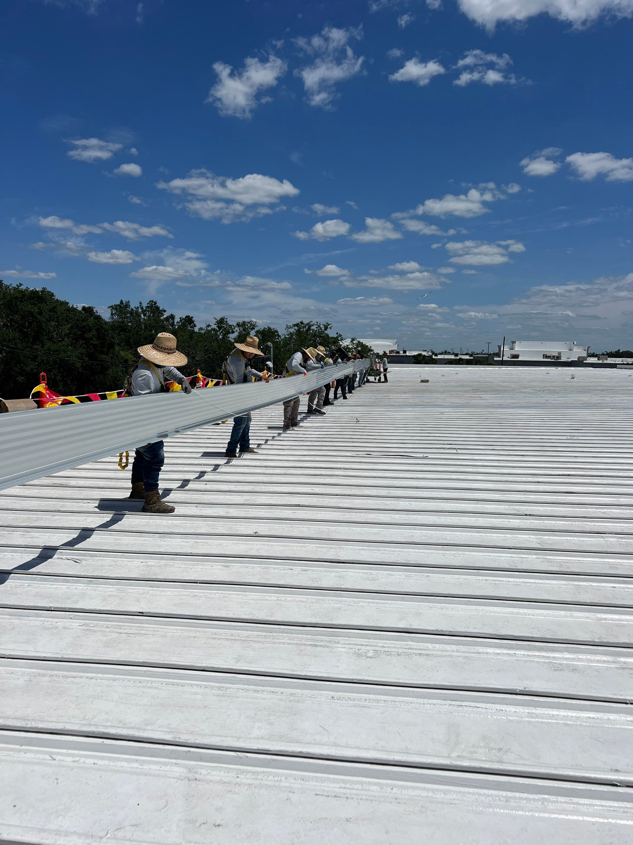 Commercial Metal Roof Replacement at Shopping Plaza in Port Charlotte by CES Roofing