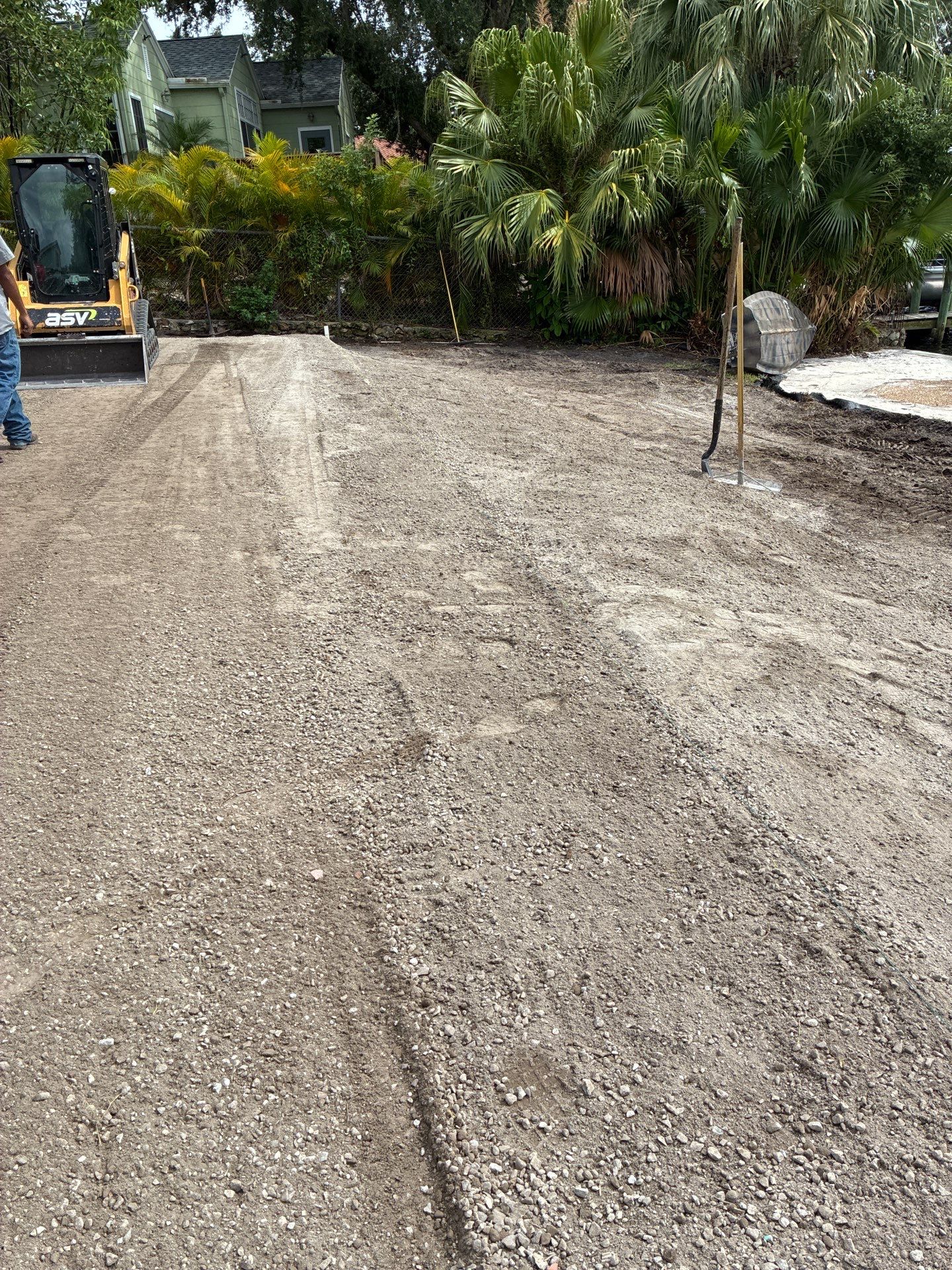 Grading back yard oasis by Level One Grading