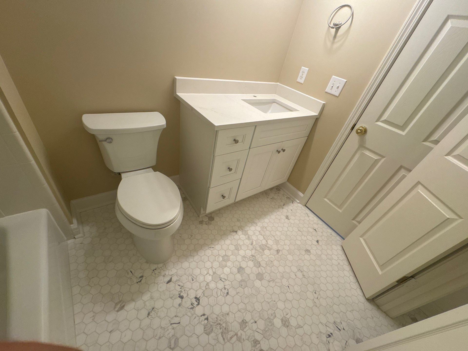 Marietta Bathroom and Laundry Room Floor and Vanity Remodel by Swift Home Renovations