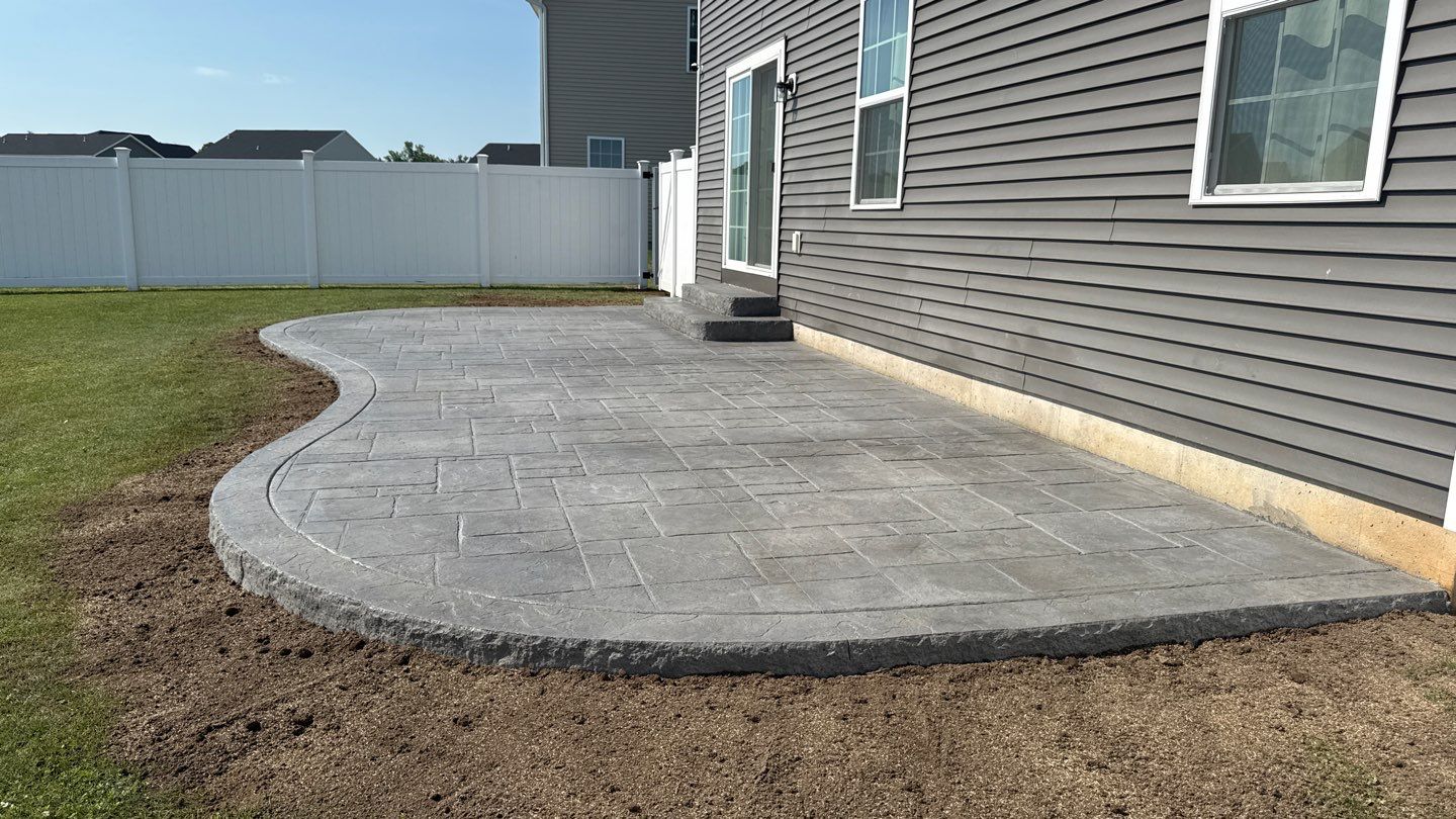 Stamped English Rivenstone Concrete Patio  by NG Masonry & Construction LLC
