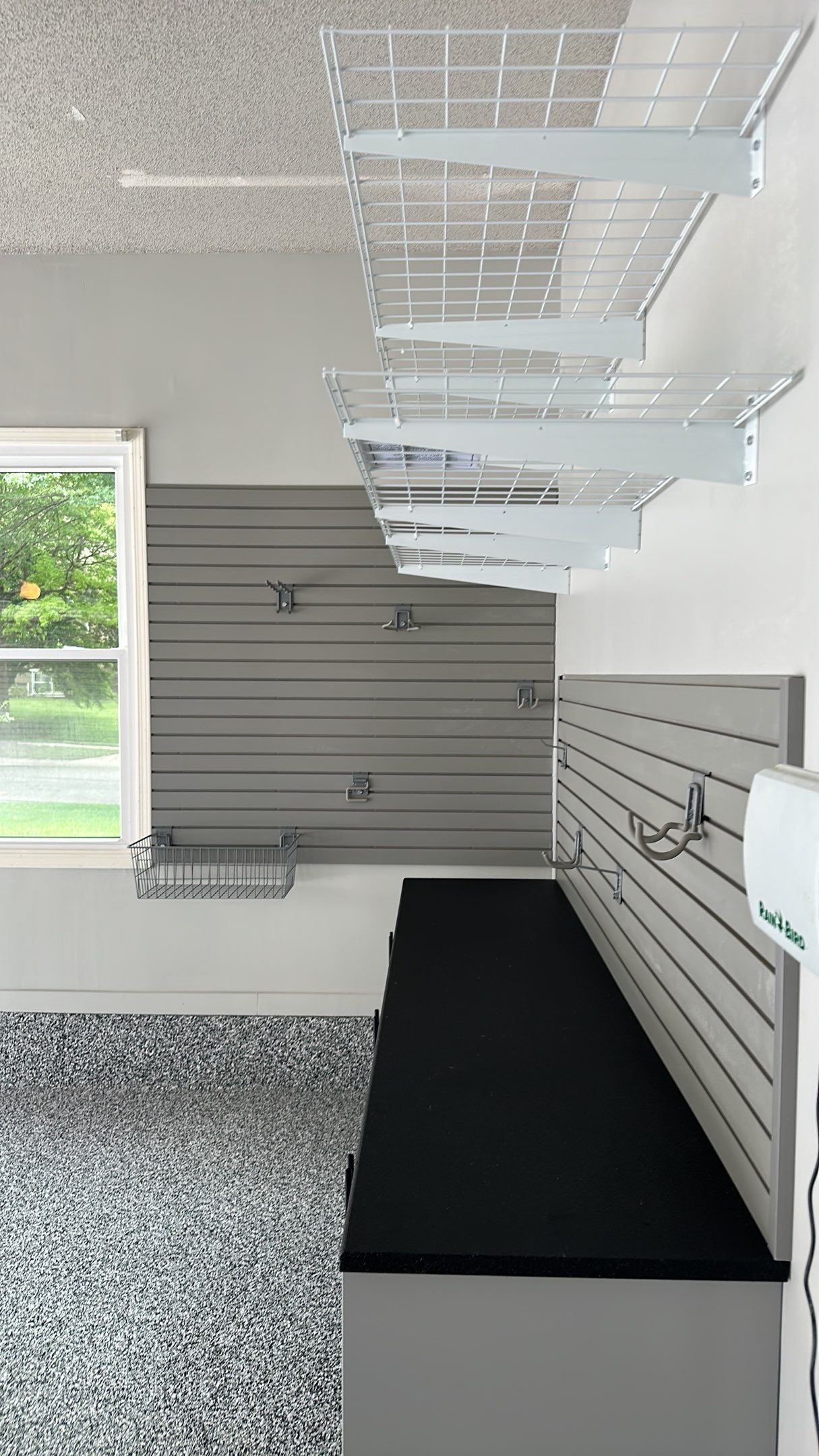 Julie H. upgraded her garage with our cabinets and wall storage options  by Banner Garage