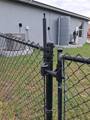 Residential Black Vinyl-Coated Chain Link Fence Installation in Port Charlotte