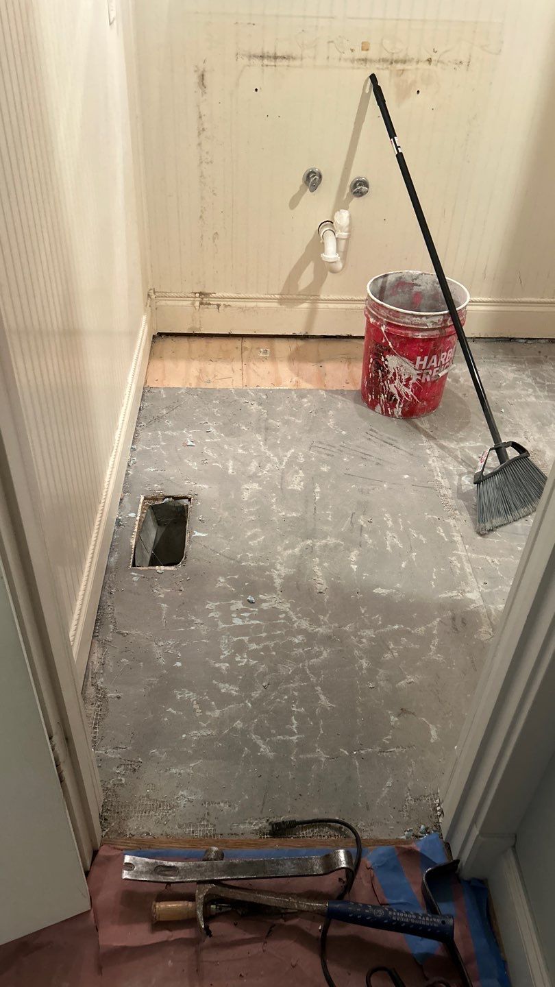 Tile shower and floor by Footprints Floors of Nashville