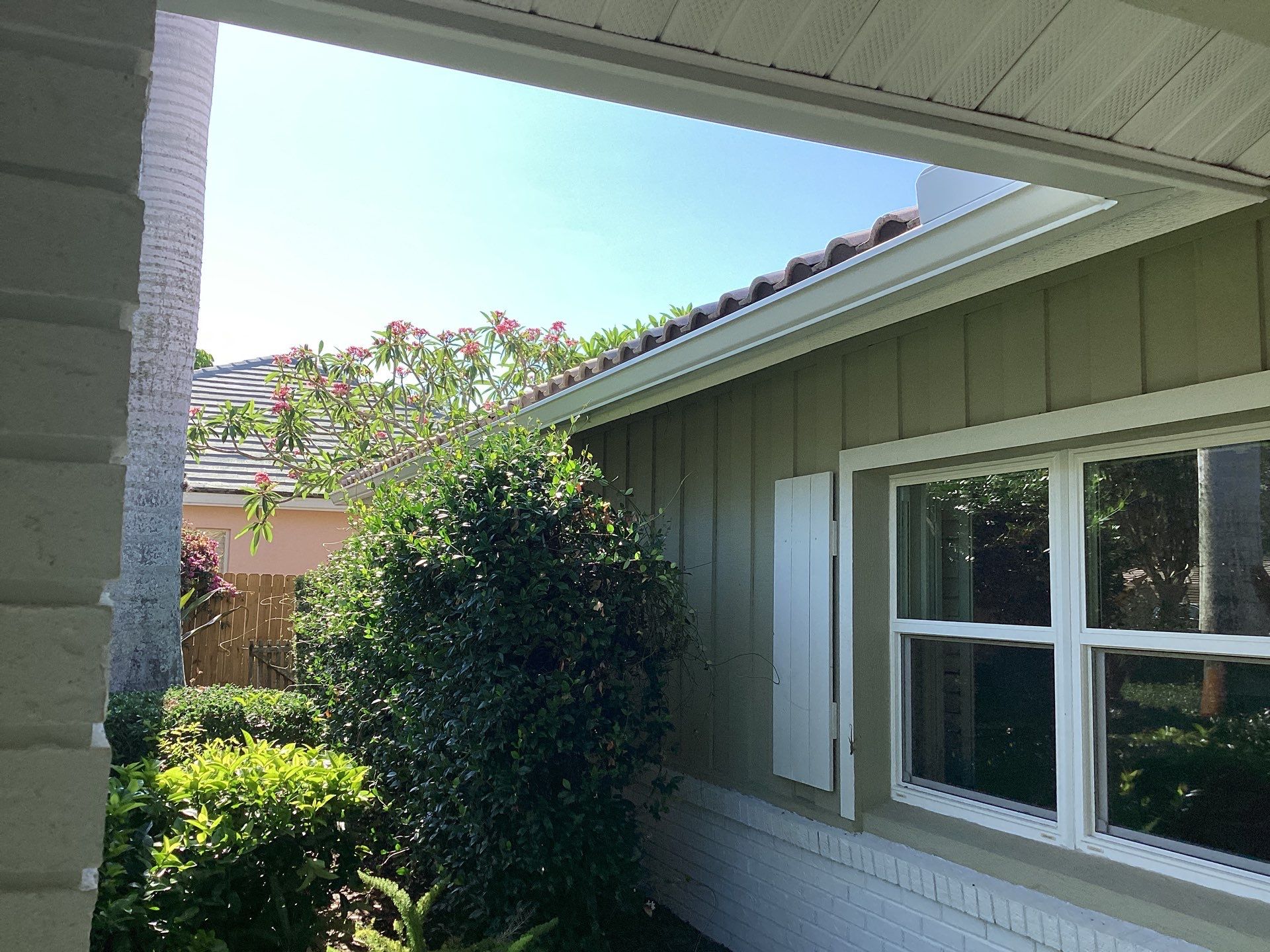 White Gutter Installation in Sarasota FL by Gutter Professors