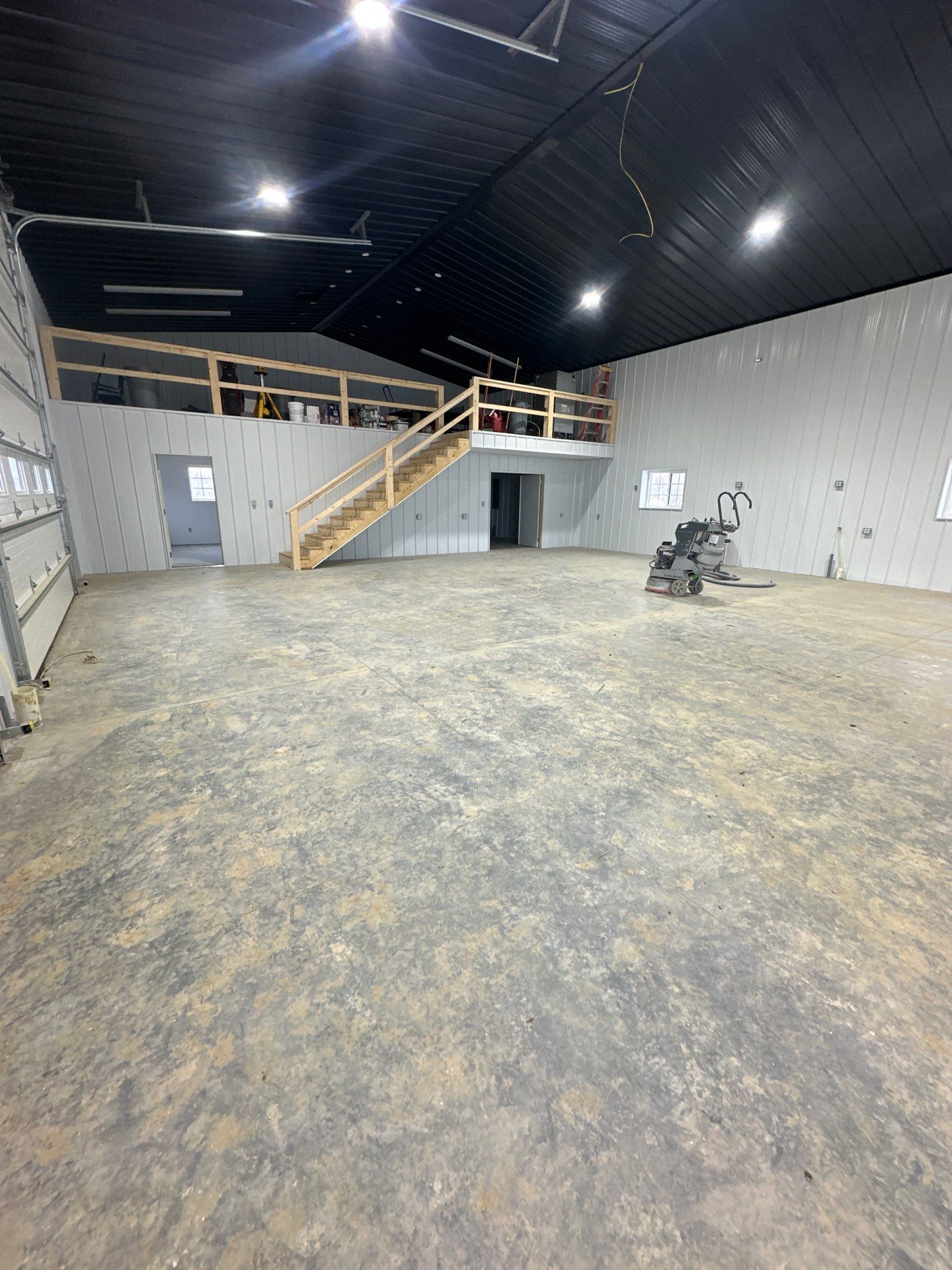 Barndominium Flake Coating using Polyaspartic by Revival Concrete Coatings