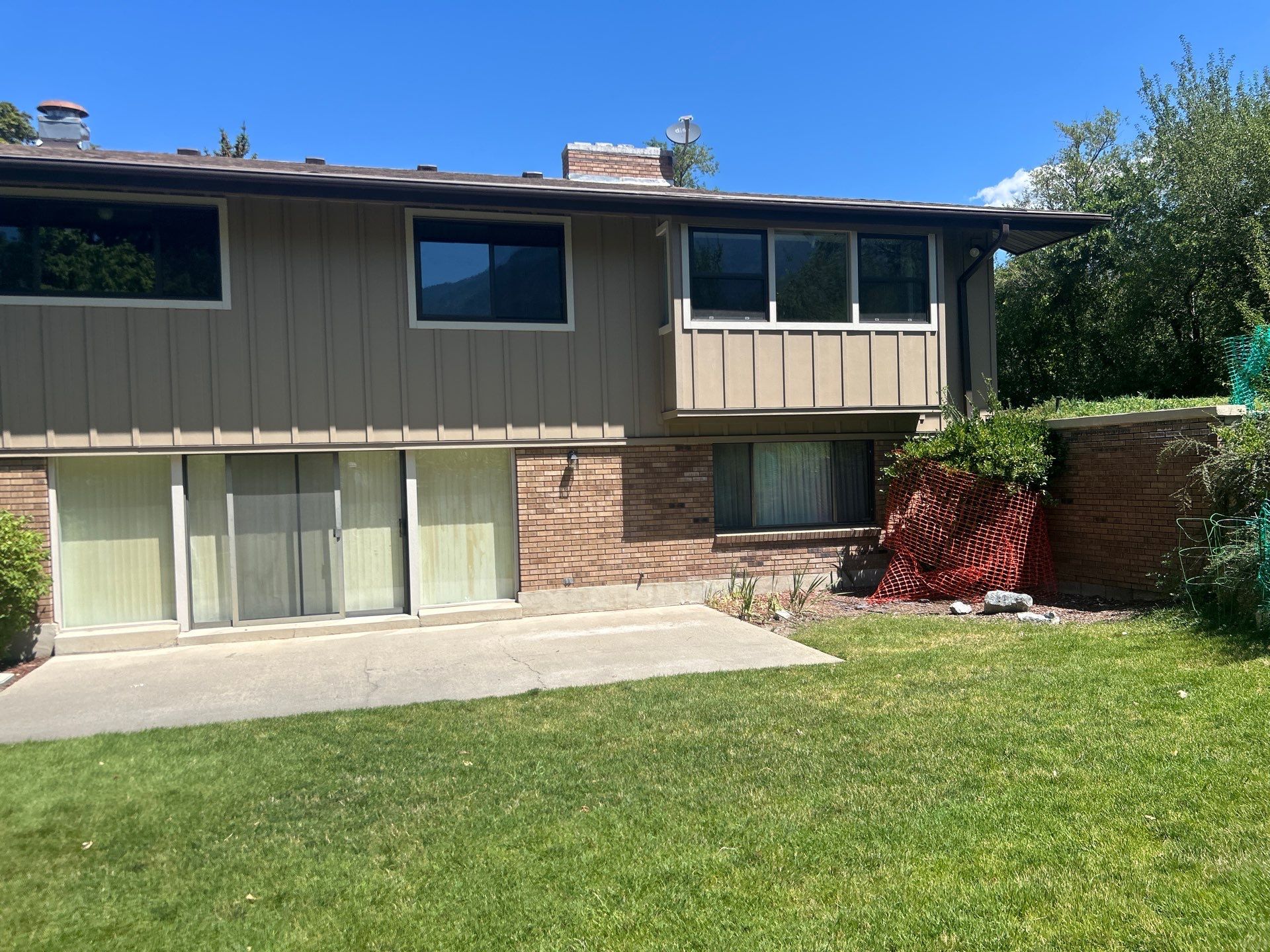 Complete Hardie Colorplus Board and Batten replacement with Custom Soffit Transformation in Sandy by Ideal Siding Utah