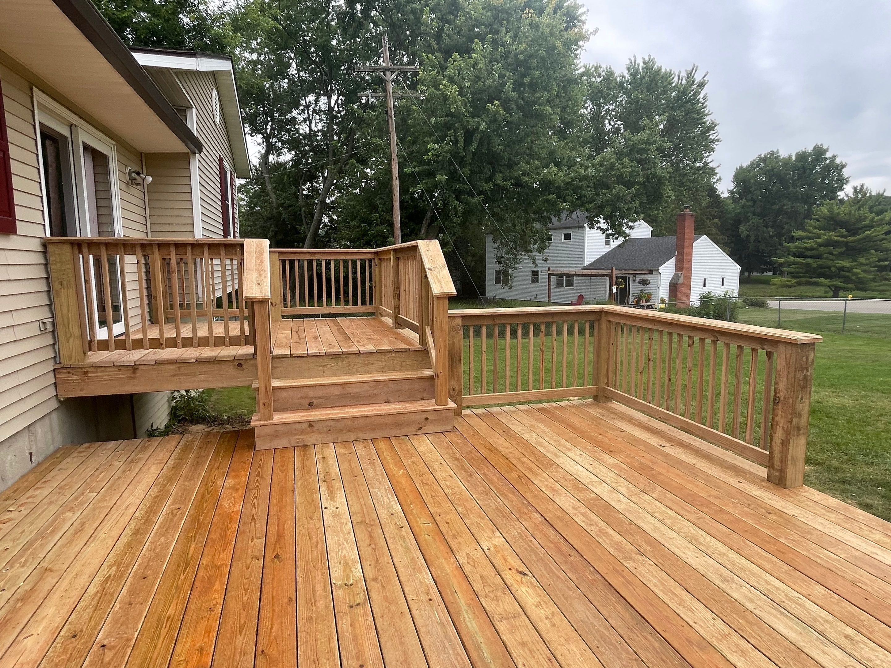 Deck Installation using Treated Lumber by Avalon Roofing and Exteriors