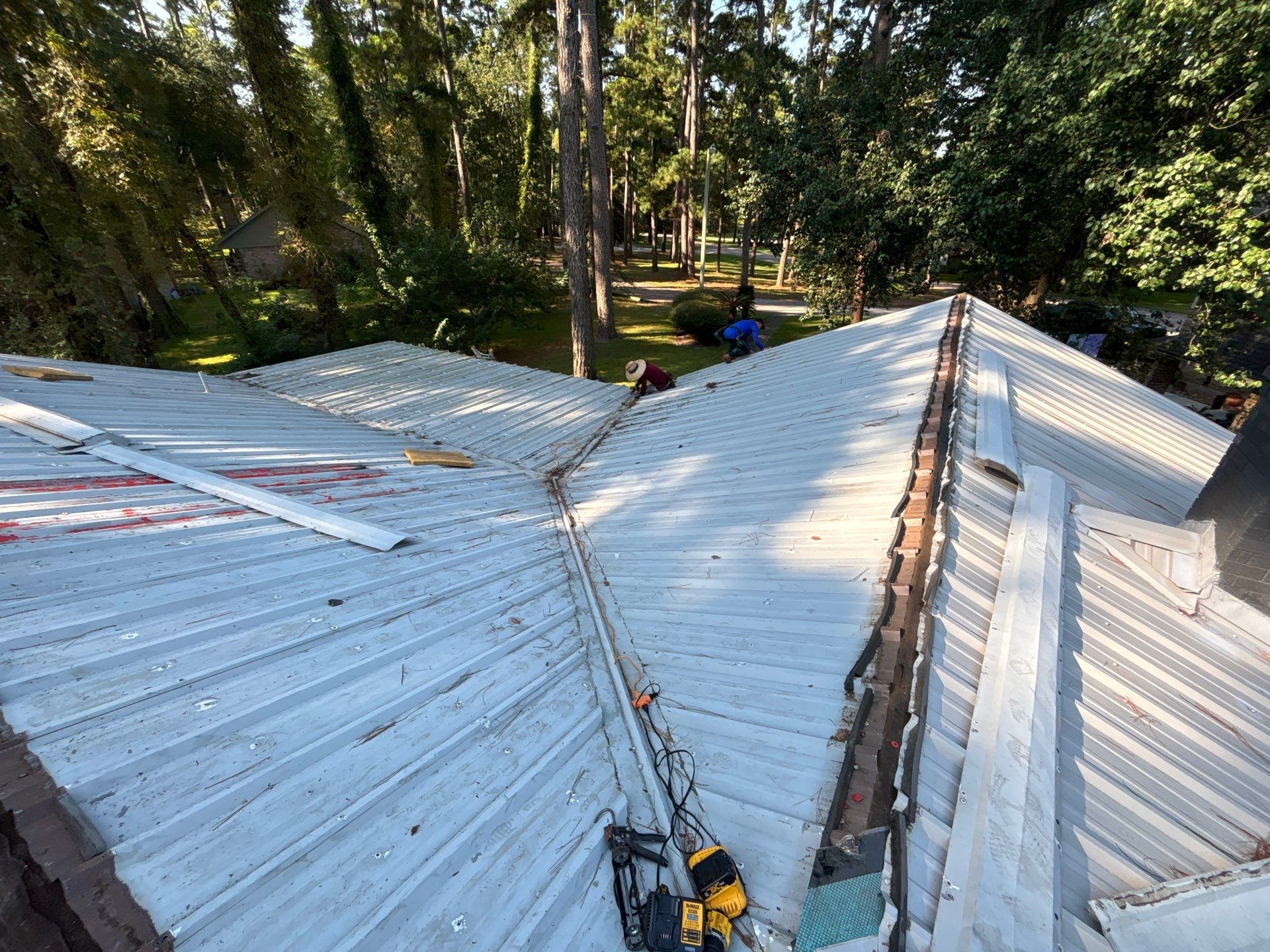 White Standing Seam Metal Roof Replacement in Willis, Texas by Abbott Roofing Company