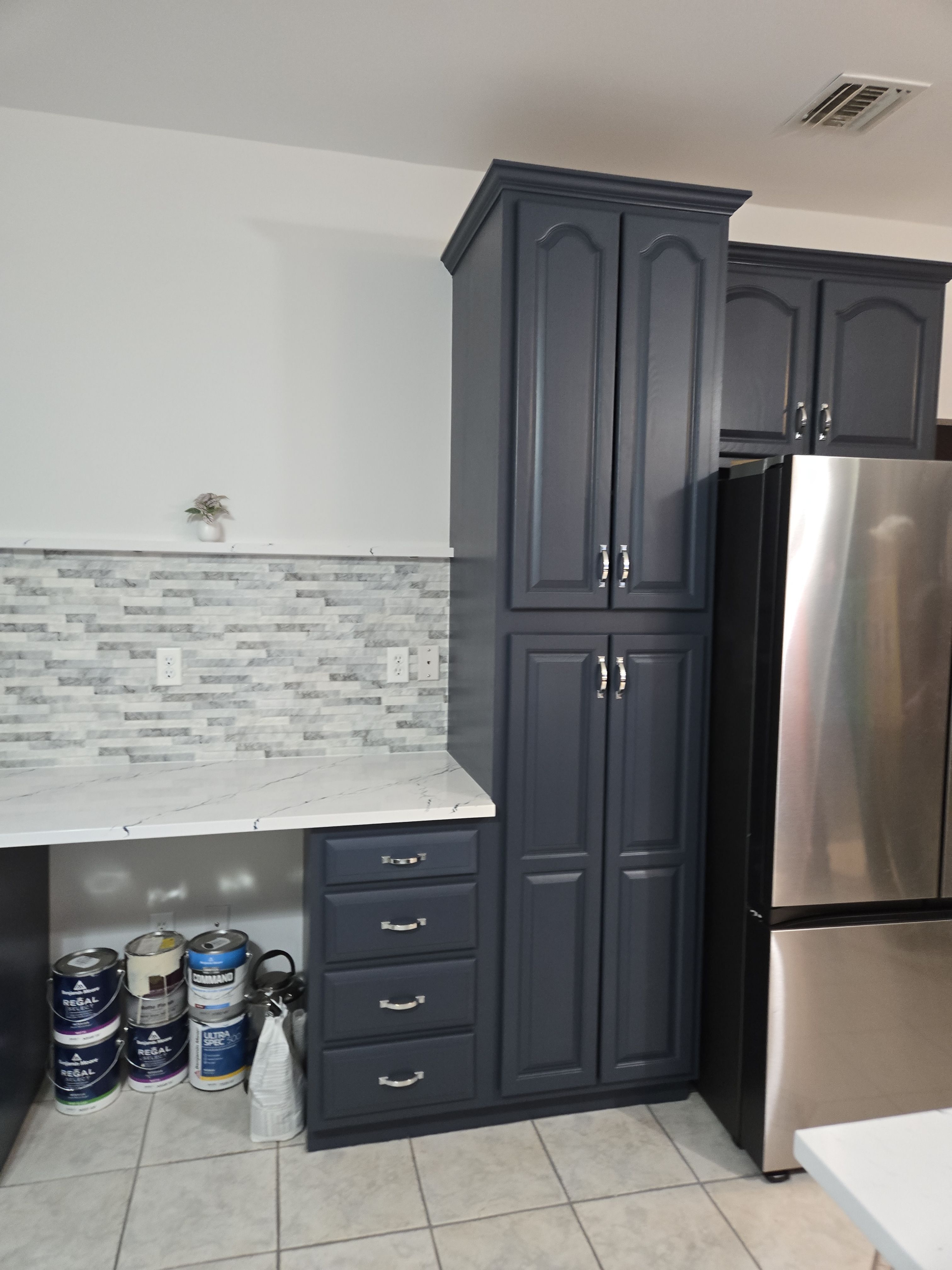 Cabinet Refinishing using Benjamin Moore Command by Spectrum Painting, LLC