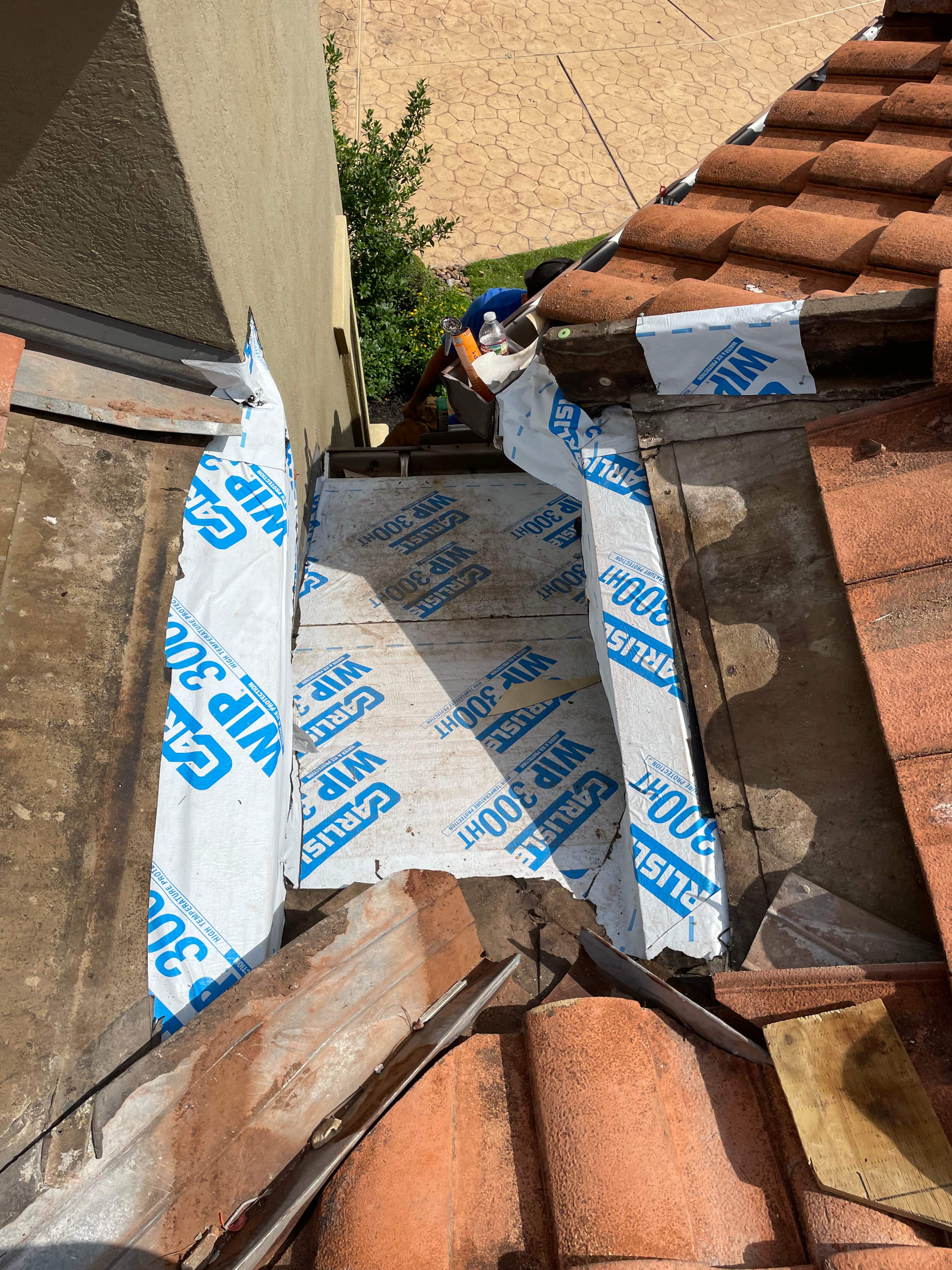 Dead Valley Repair on a Tile Roof  by Associates Roofing Unlimited 