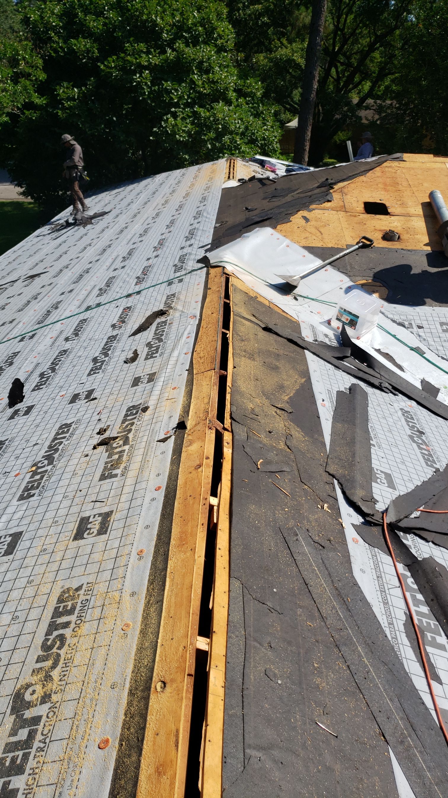 Residential Roofing Installation using Roof Replacement by American Roofing & Construction LLC