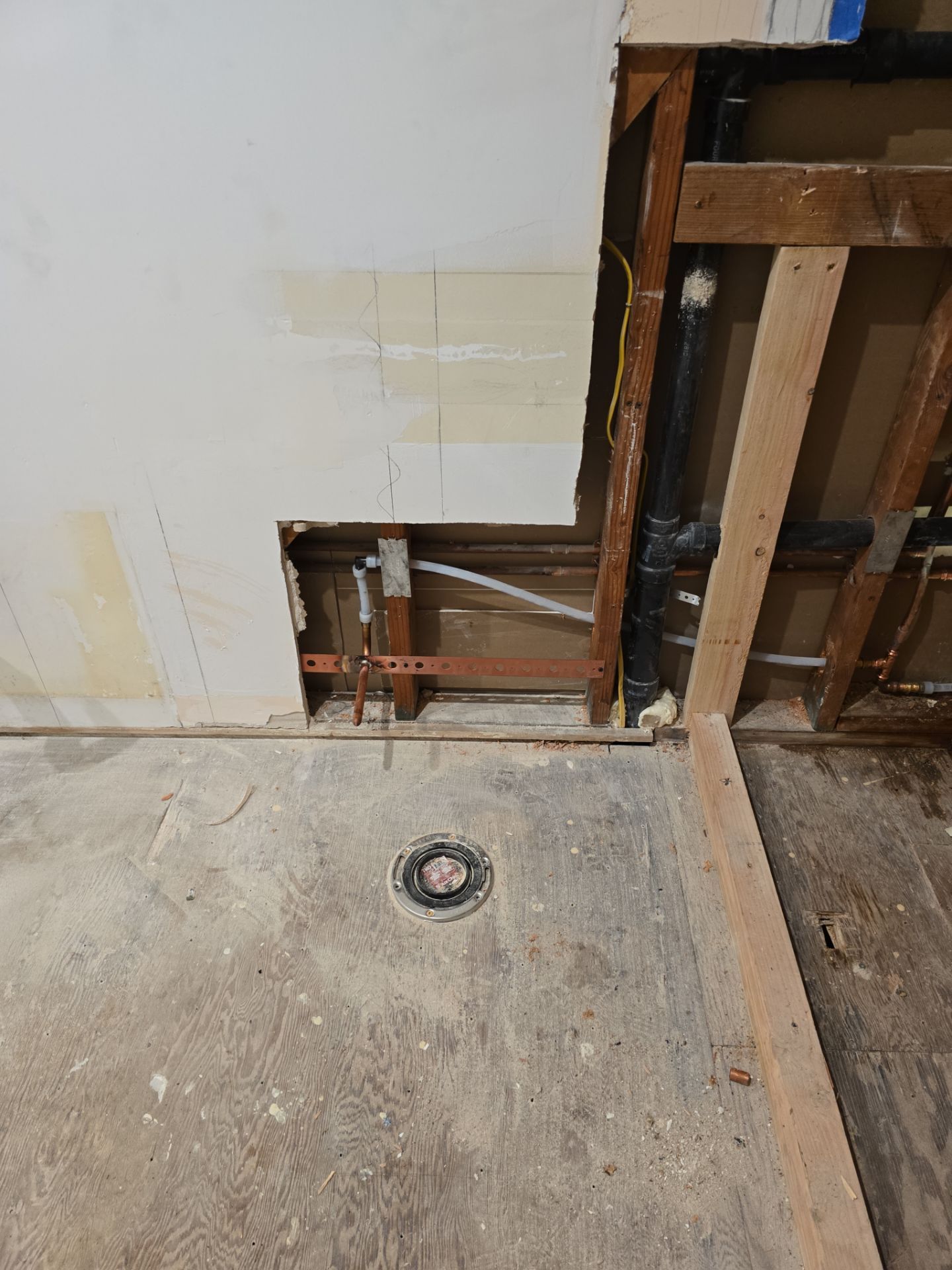 Installation of New Tall Black Piping (Wall to Ceiling) & Underground Piping by Us Plumbing