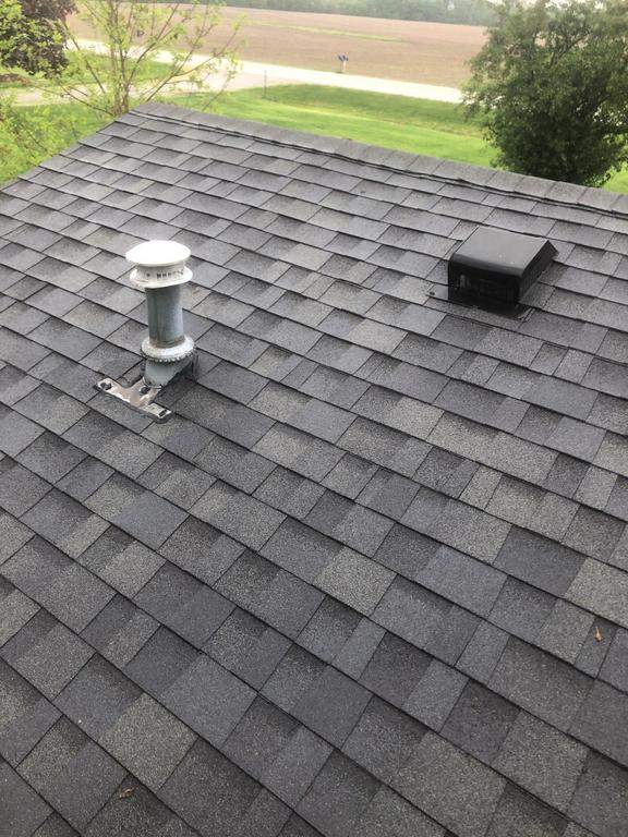 Residential Roofing Installation using 60 mil rubber roof  by Nitro Roofing and Construction
