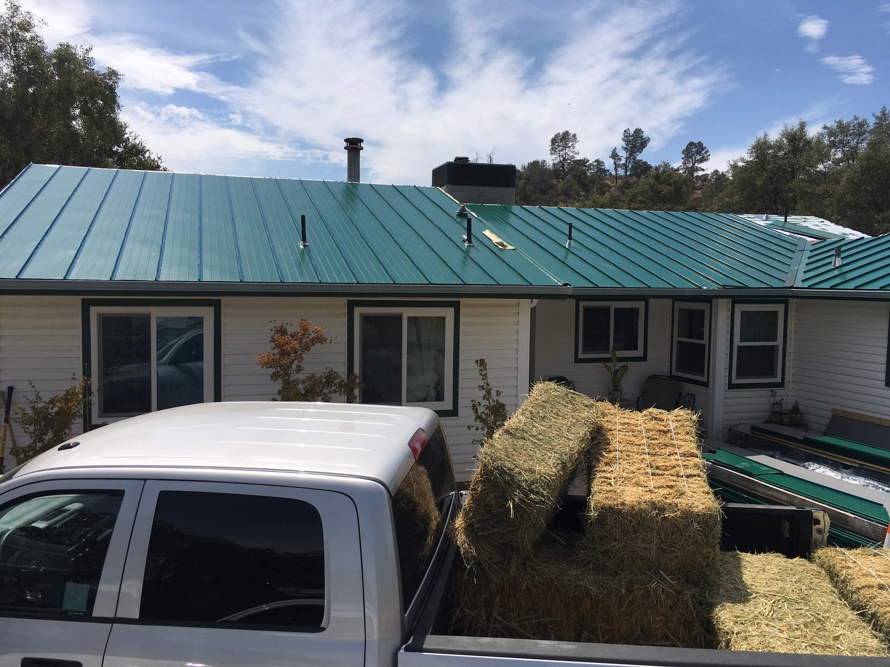 Metal roofing installation using Standing seam metal roofing system by Straight Edge Roofing Inc
