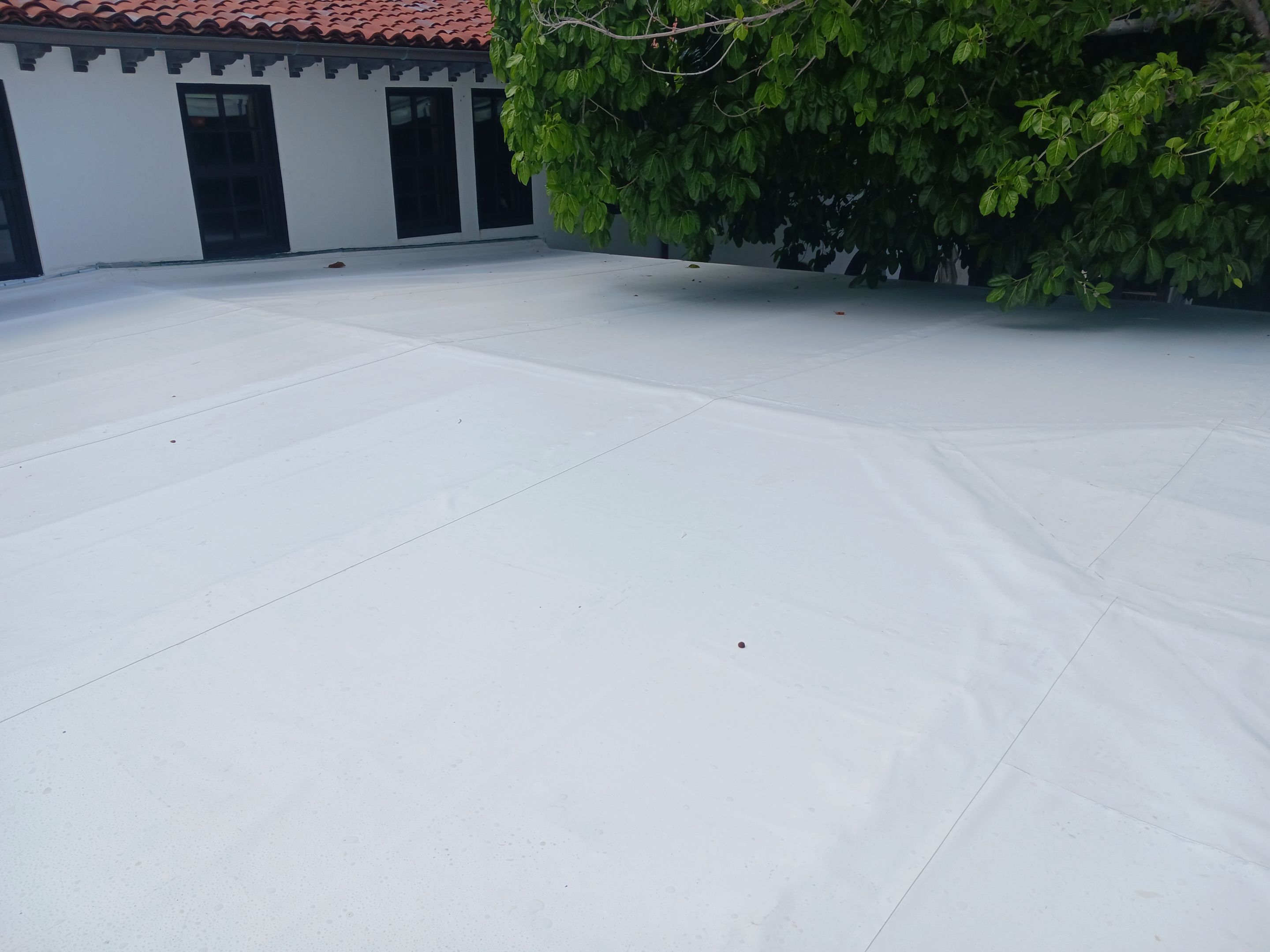 Commercial Roof Membrane Installation and Clay Tile Repair in Surfside by AJF ROOFING INC