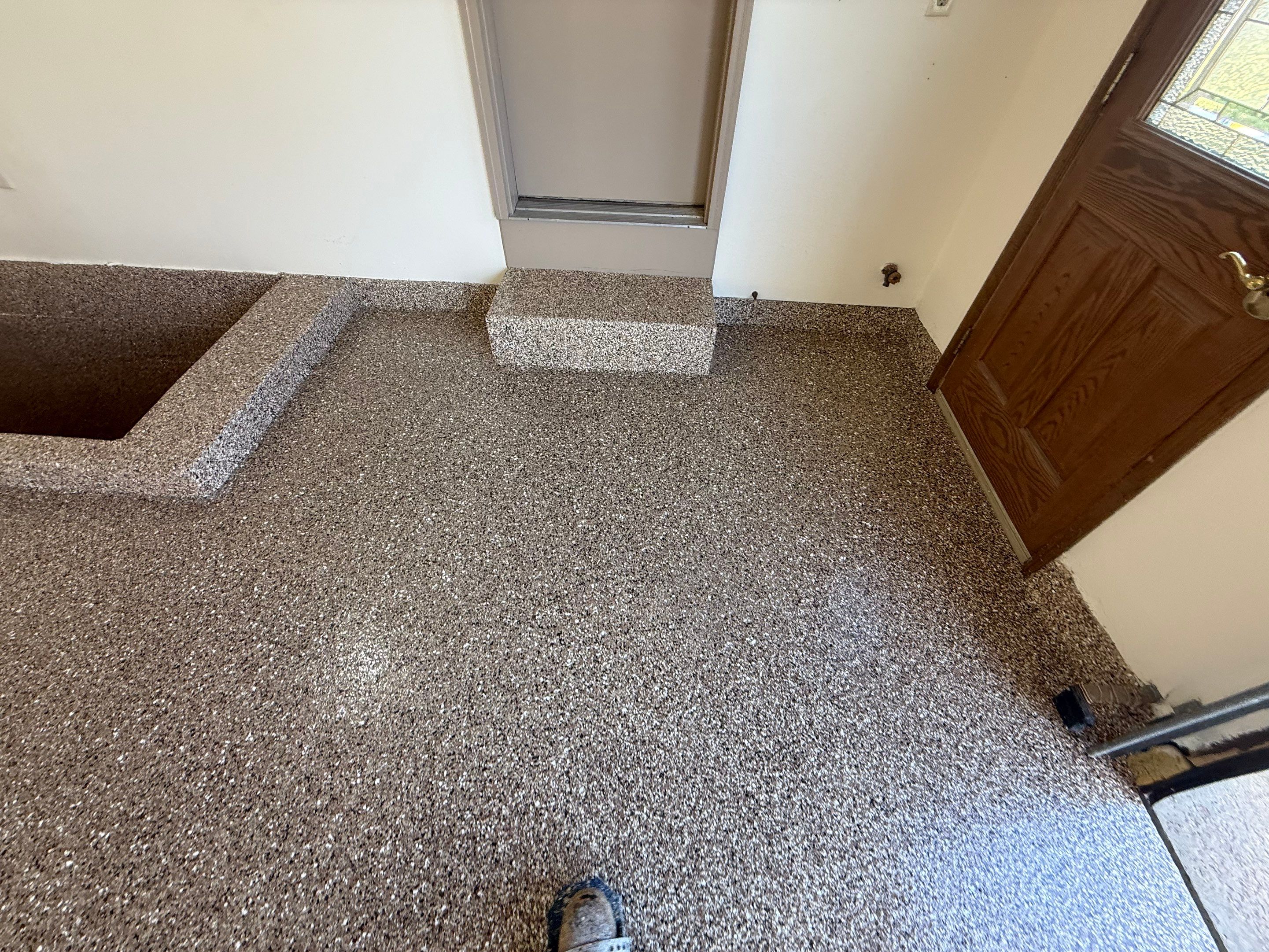 Custom Polyaspartic Garage Floor and Stairwell Coating in Pipestone by Select Painting, Coatings & Garage Cabinets