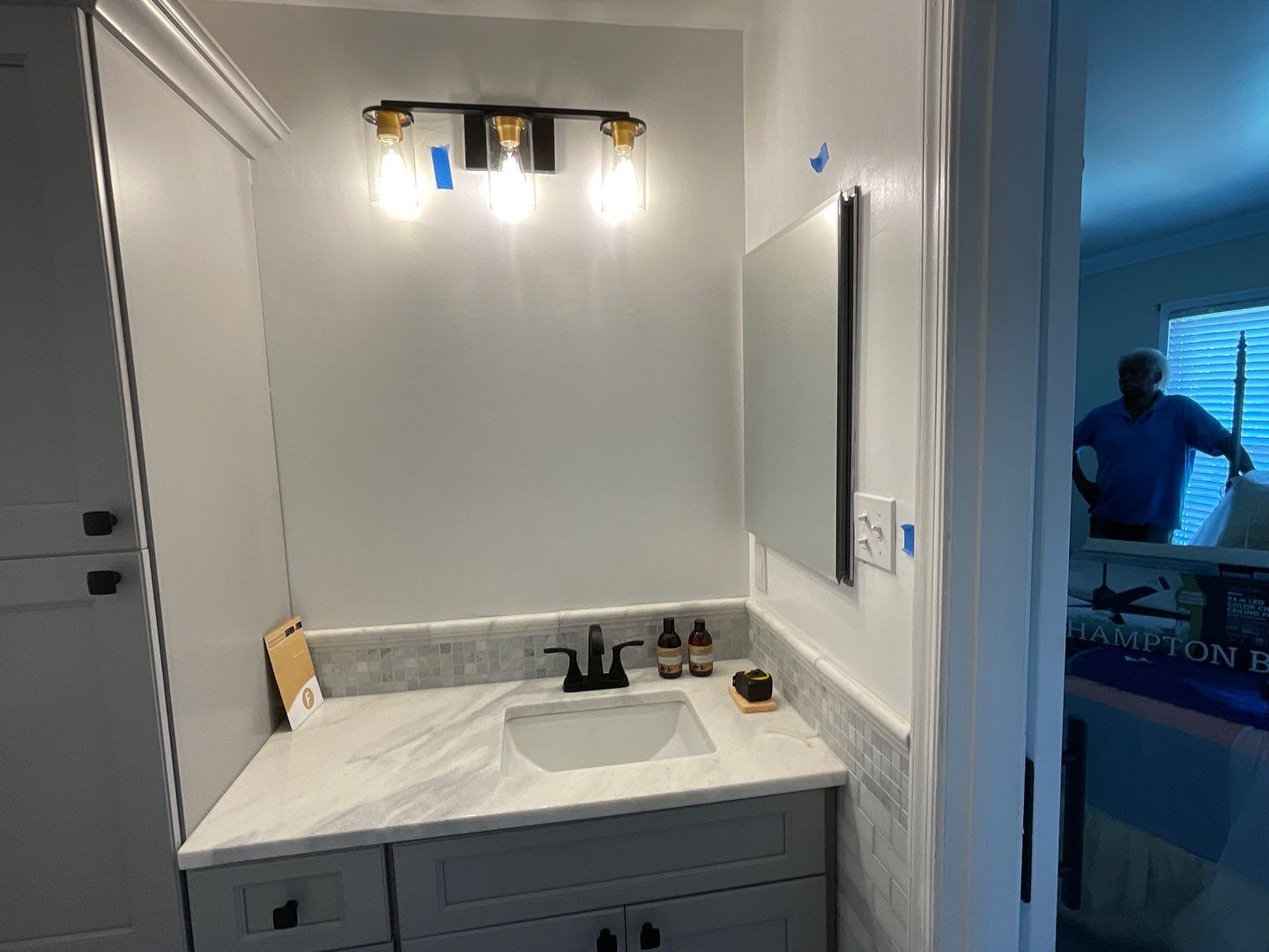 Bathroom Remodel using Two new bathroom design and new floors by Alpha Design Services