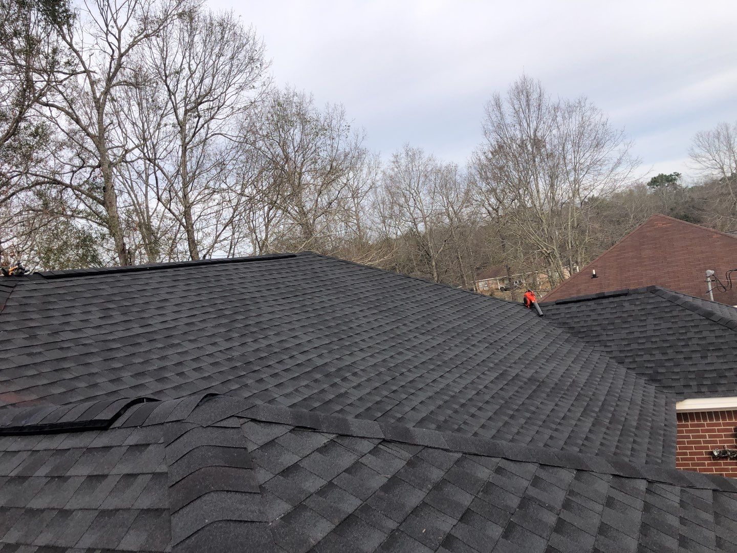 Residential Roofing Installation using Roof Replacement by American Roofing & Construction LLC