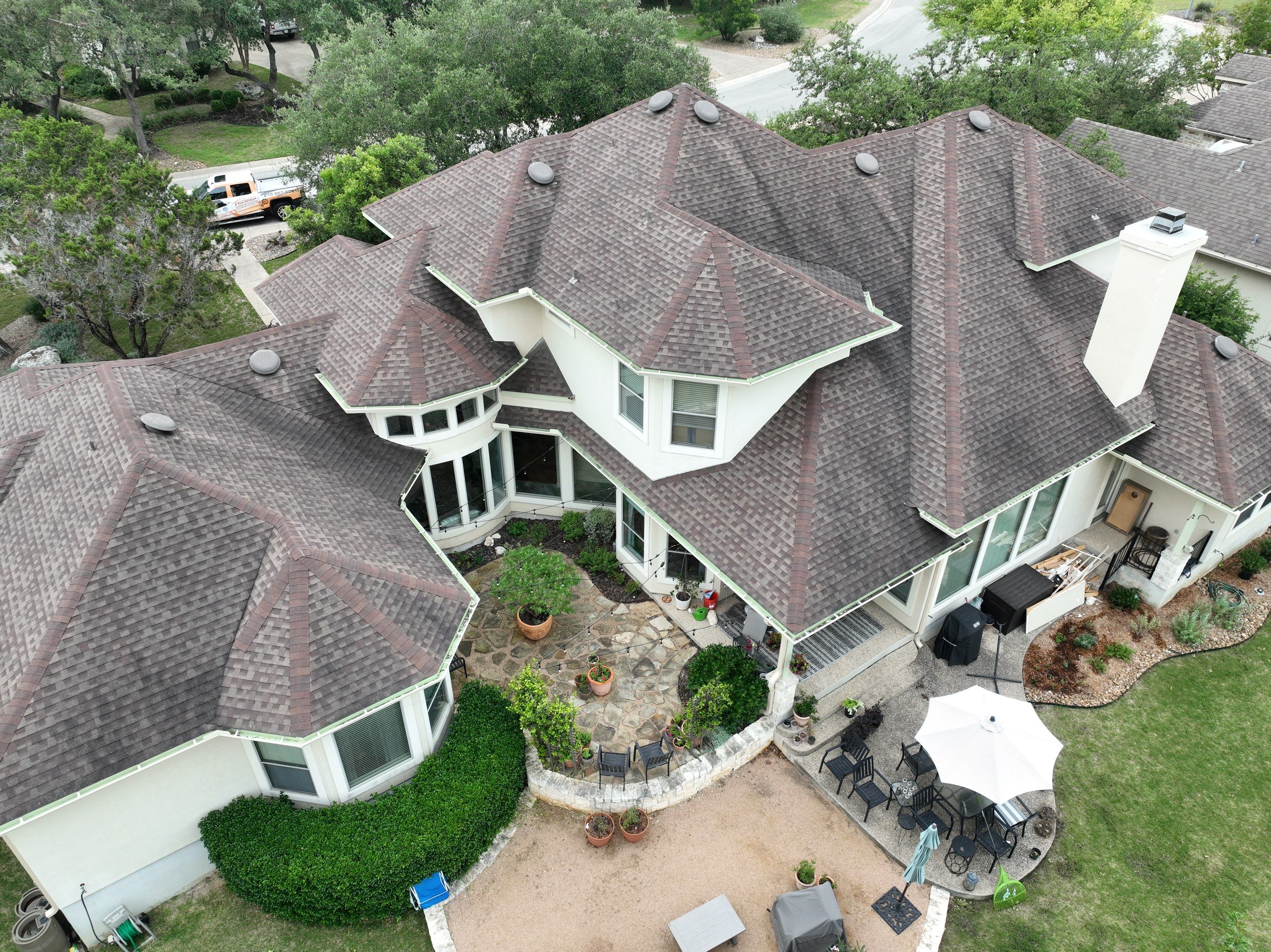 Residential Roof Replacement using 30 Year Laminate Shingles with High Profile Ridge by Premier Roofing and Contracting