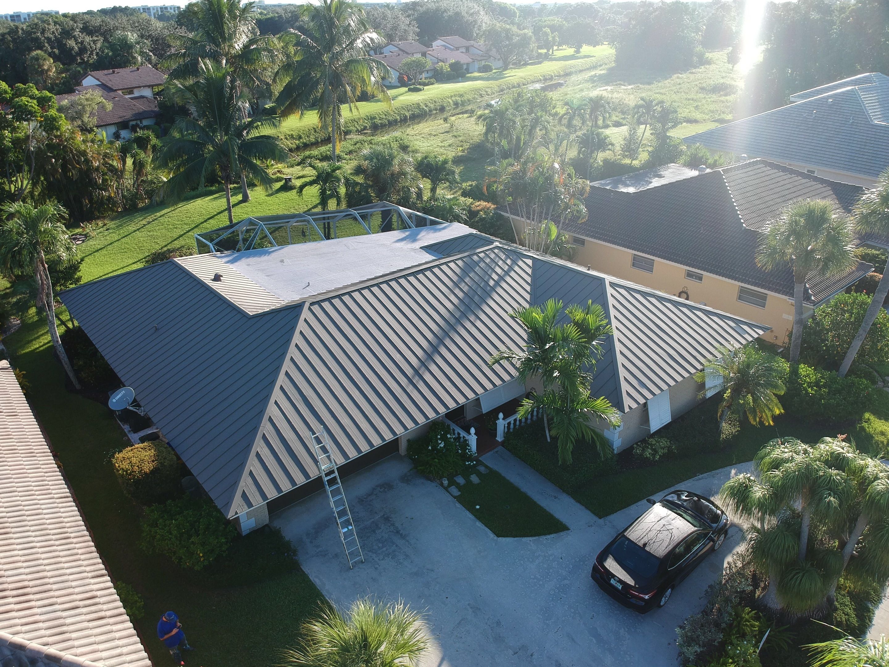 Residential Roofing Installation using 1" Nail strip metal roof by BLUES BROTHERS CONSTRUCTION CORP