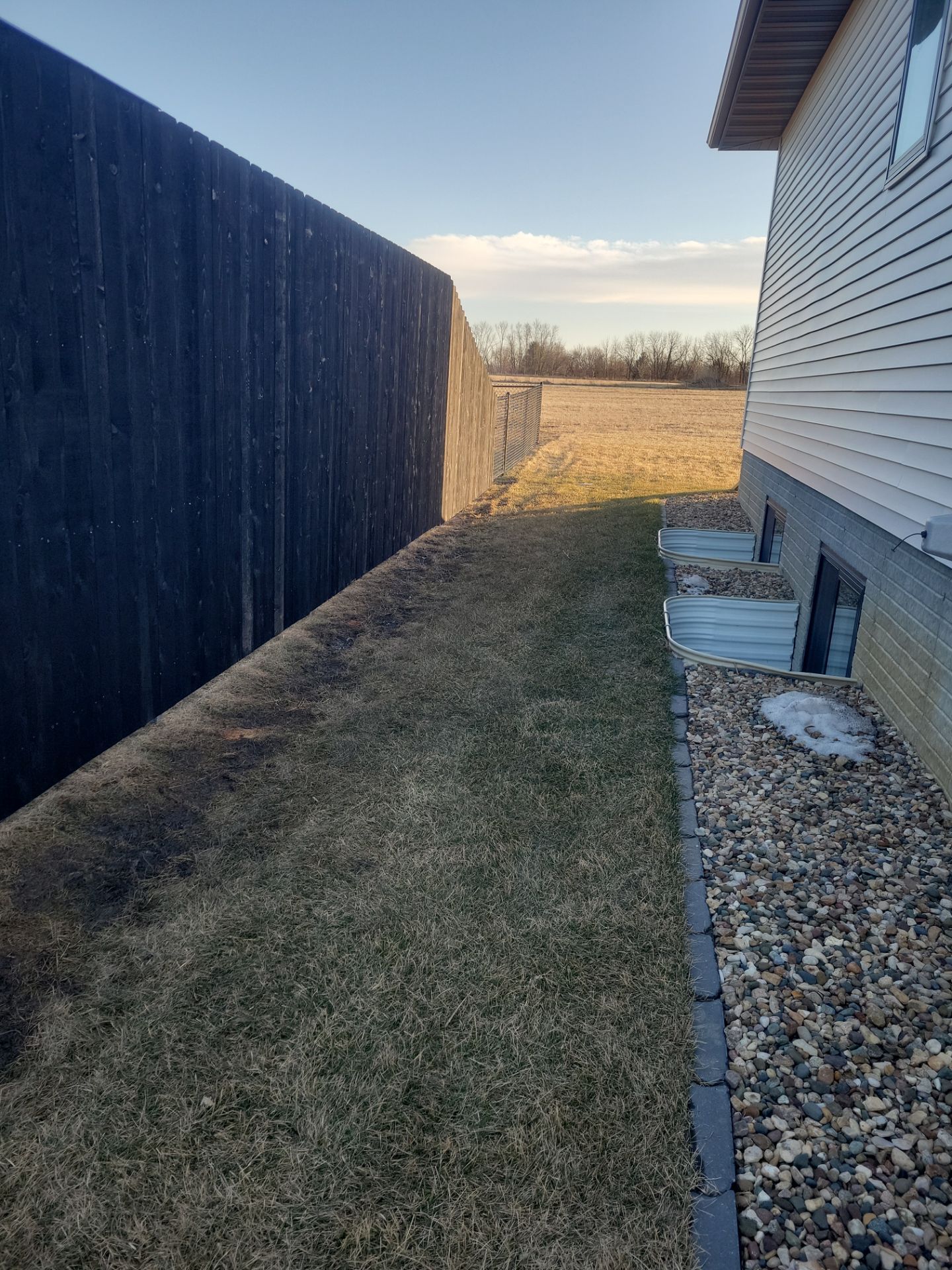 Residential Fencing Installation for New Construction Homes in Cedar Falls by Perfect Picket Fence and Stain