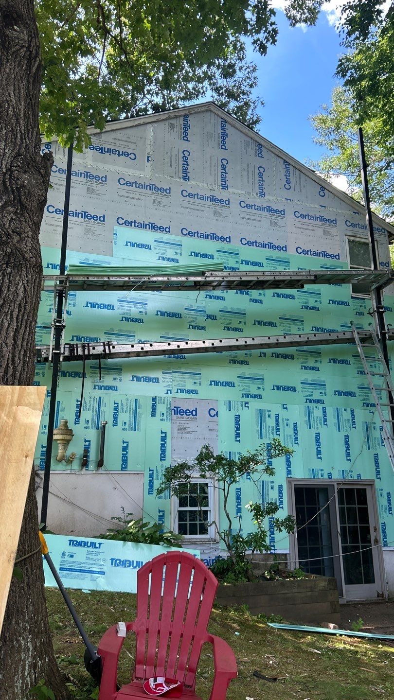 Siding Revival with Cert Monogram D/4 x 12'6" clapboard Heritage Cream by DiGiorgi Roofing and Siding Inc