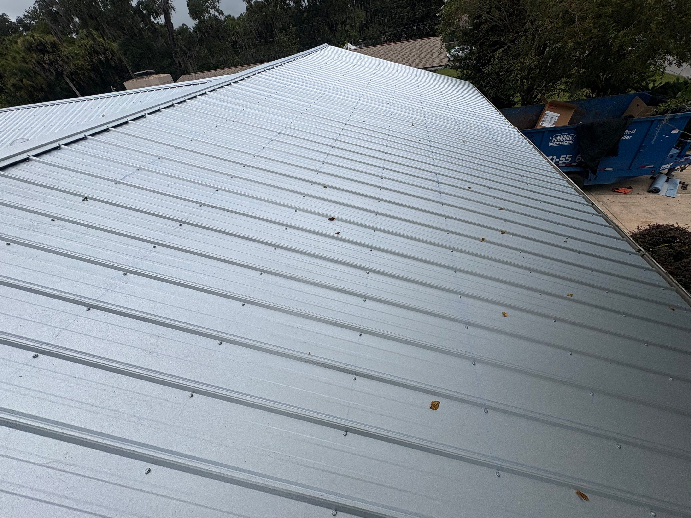 Residential Metal Roofing Installation with Ultra Rib Panels in New Smyrna Beach by Pinnacle Roofing Group
