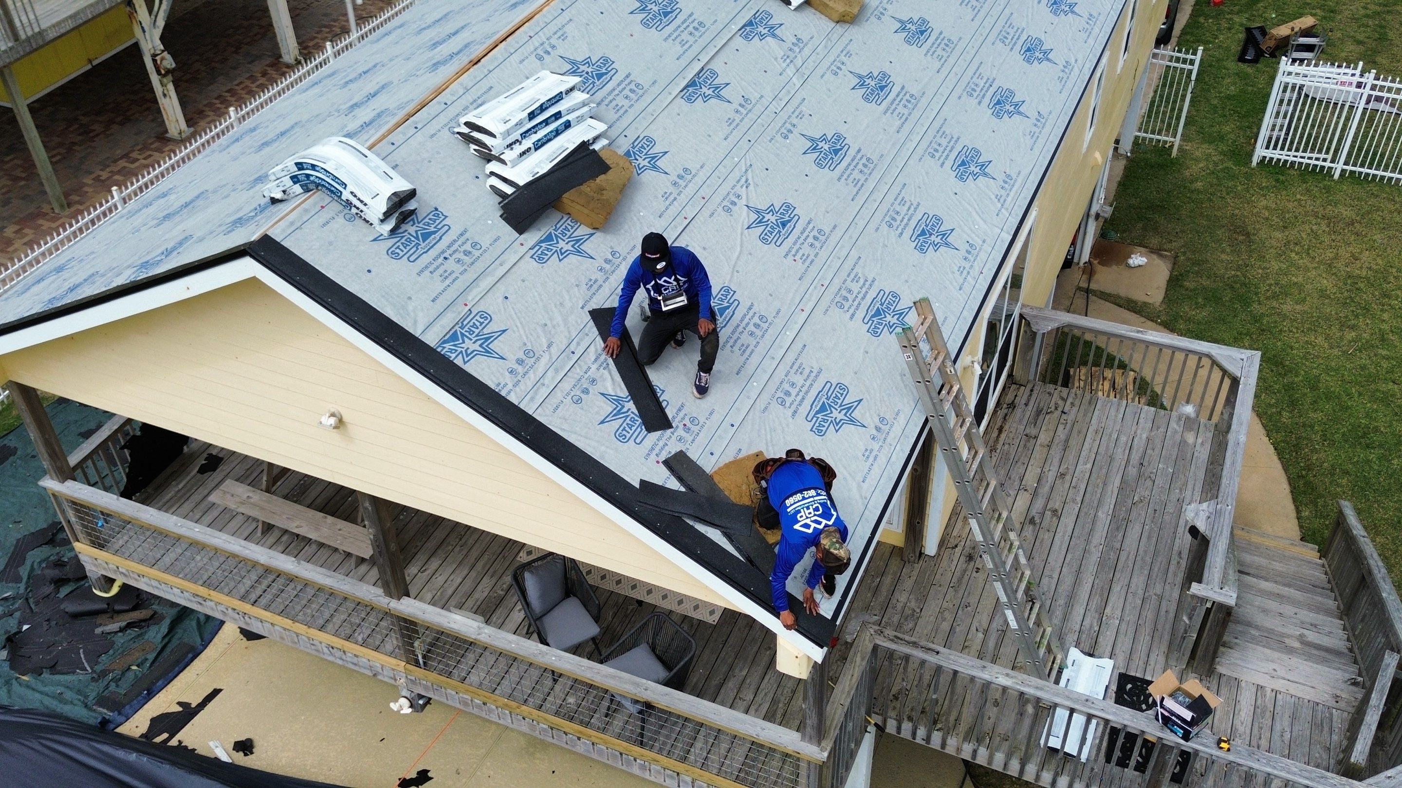 Roof Replacement using IKO Cambridge Dual Grey by CAP Roofing and Construction LLC
