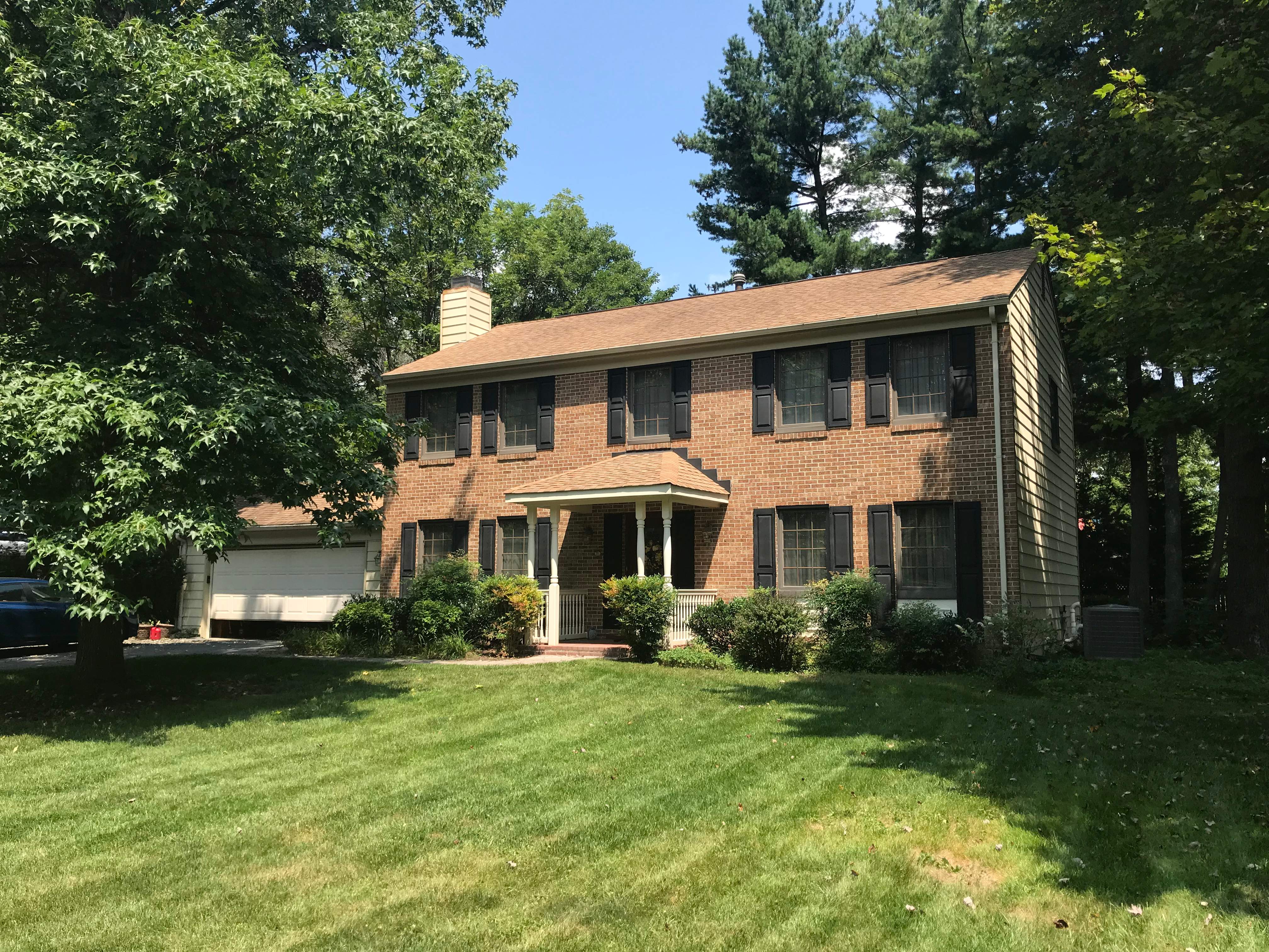 Residential Roofing Installation using Landmark Shingles Color Weatherwood by Alpha Design Services