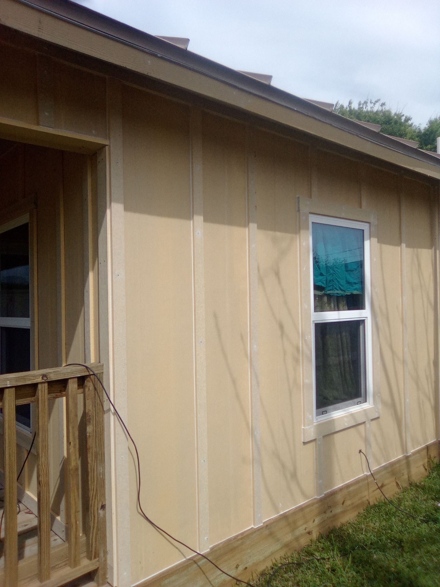 Vinyl to Hardie by Bayfront Roofing and Construction