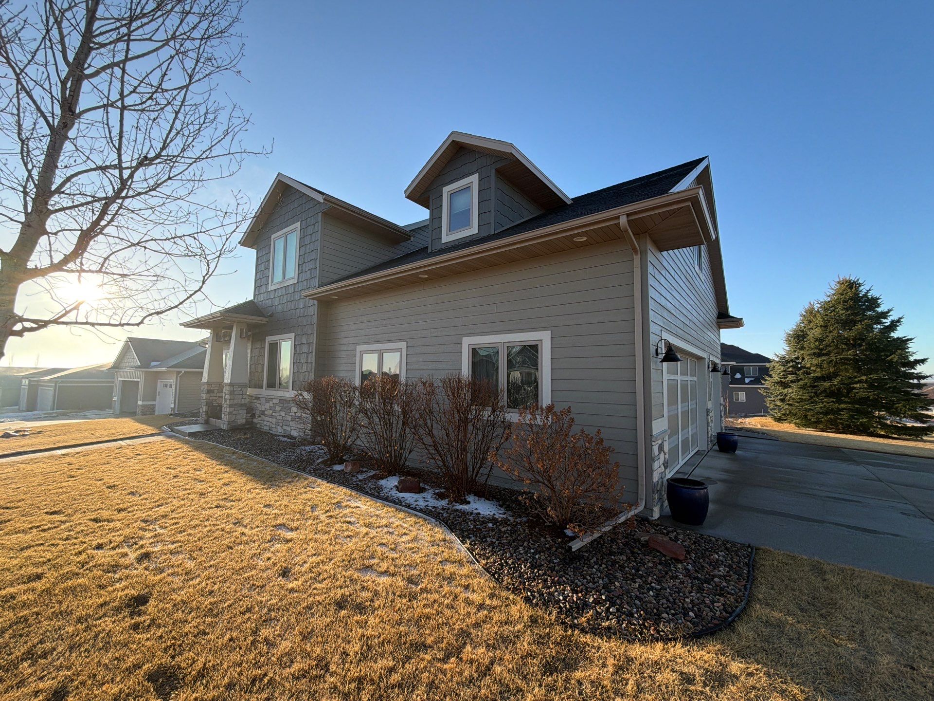Residential Exterior Painting and Color Update in Sioux Falls by Select Painting, Coatings & Garage Cabinets