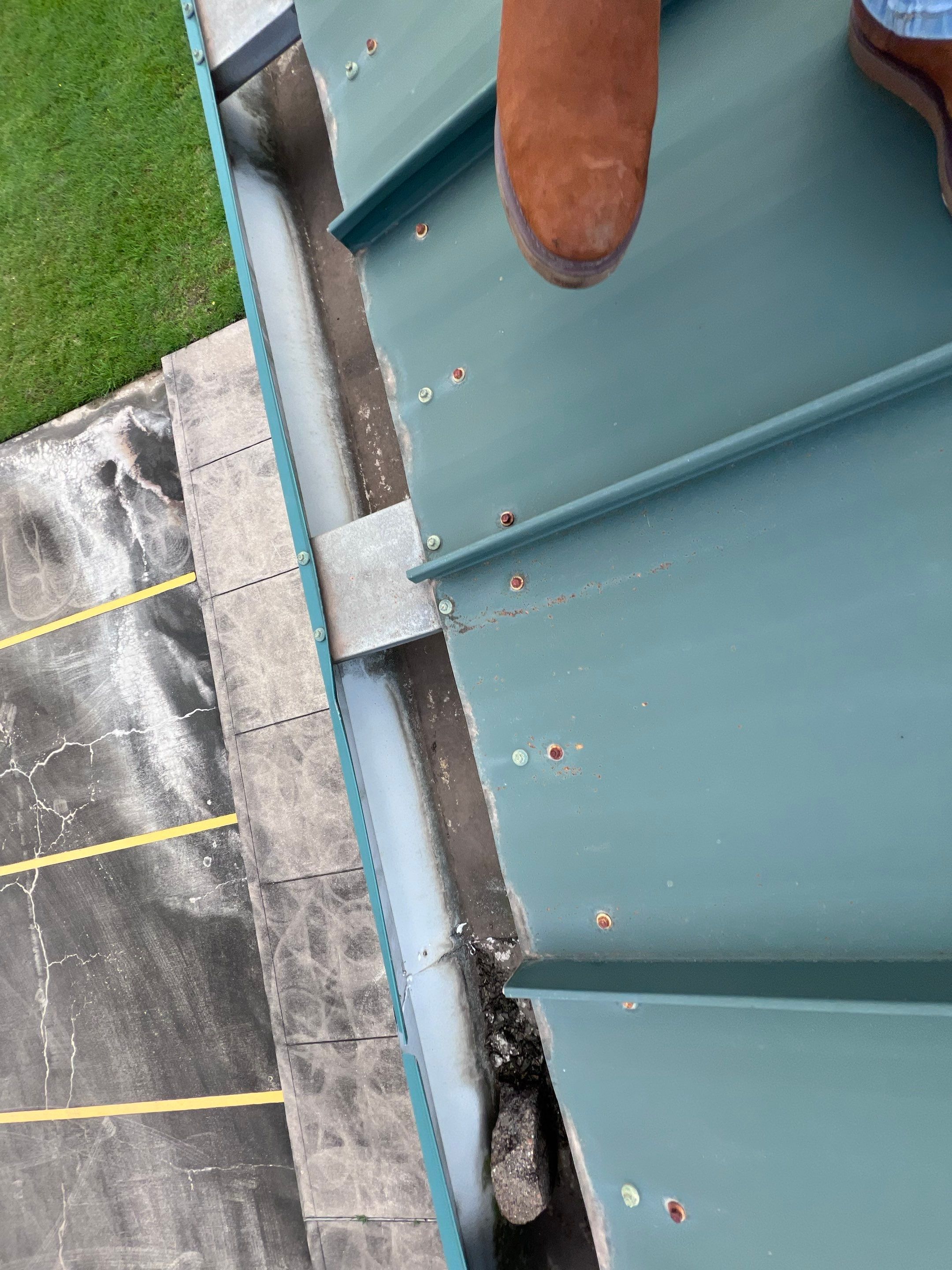 Hail Damage using Metal by Roof Repair Company