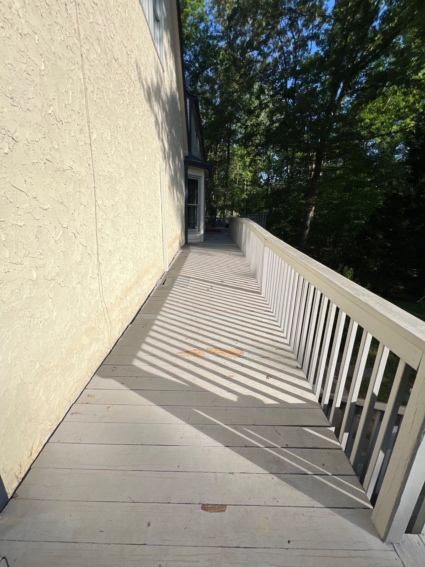 Pressure-Treated Wood Deck Resurfacing and Staircase Reconstruction in Canton by Swift Home Renovations