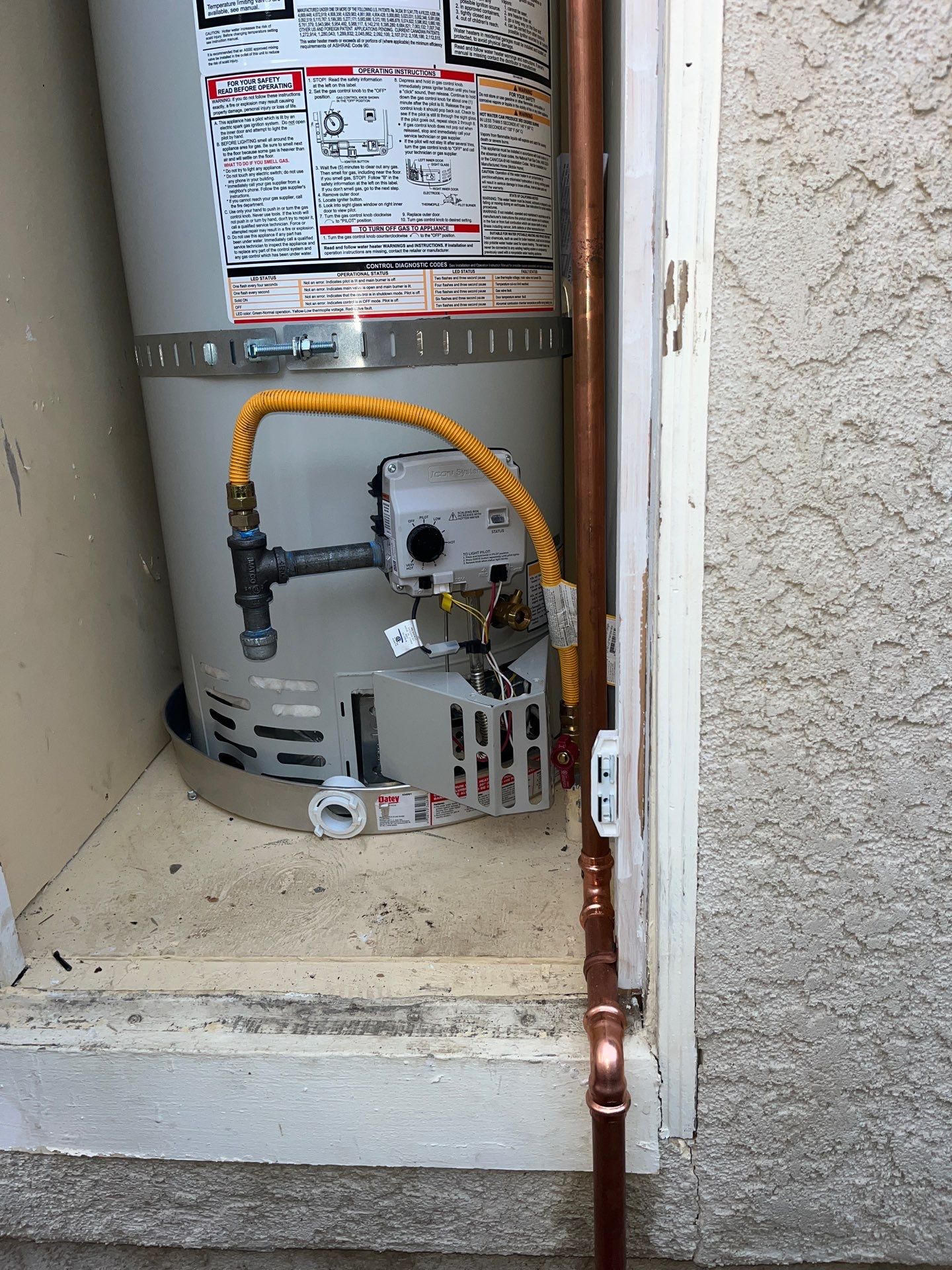 Water Heater Installation and Outside Piping by Us Plumbing