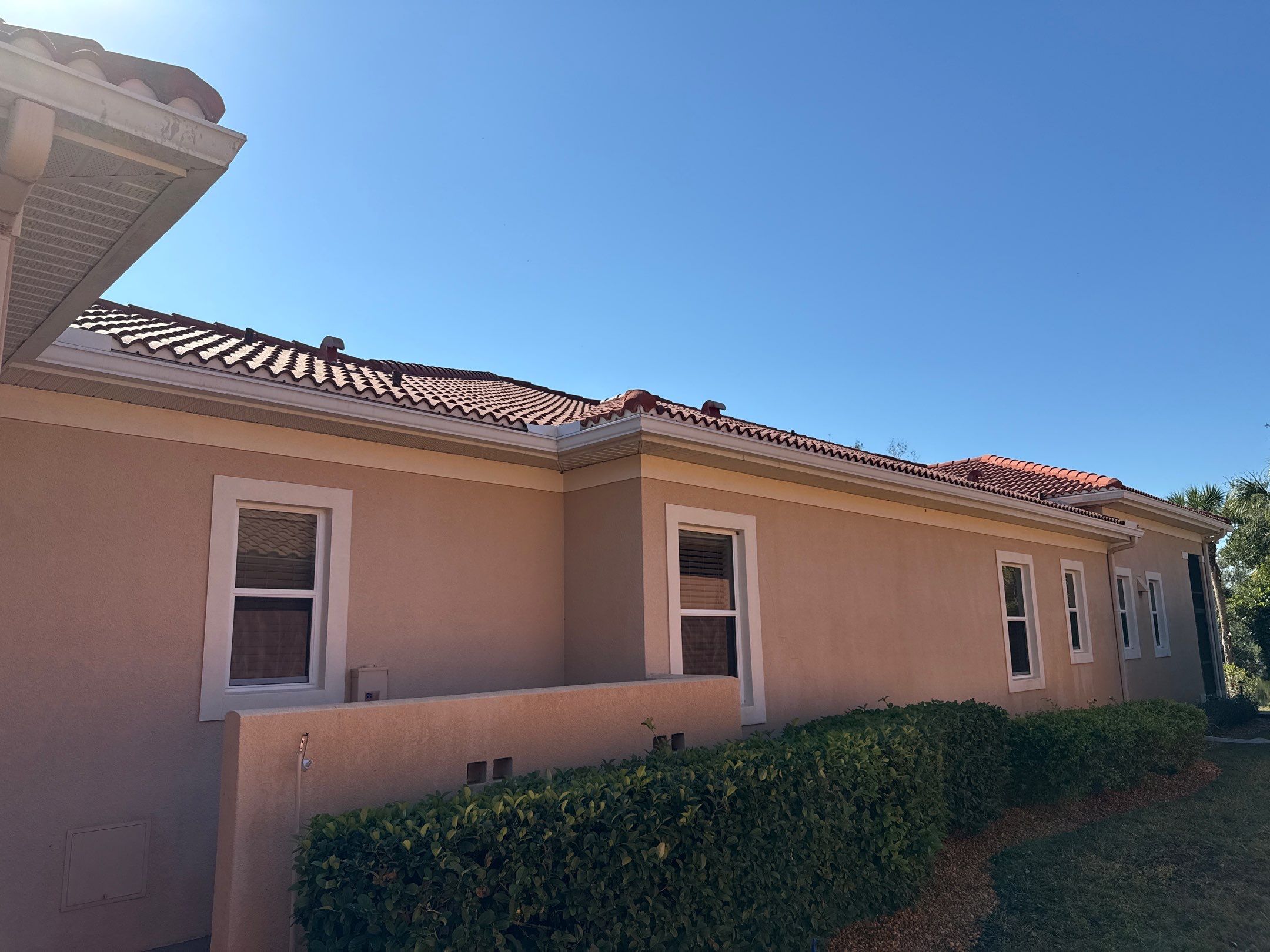 Tile Roof Cleaning & Oil Stain Removal | Tara River Place, Bradenton FL by Sunshine AquaWash