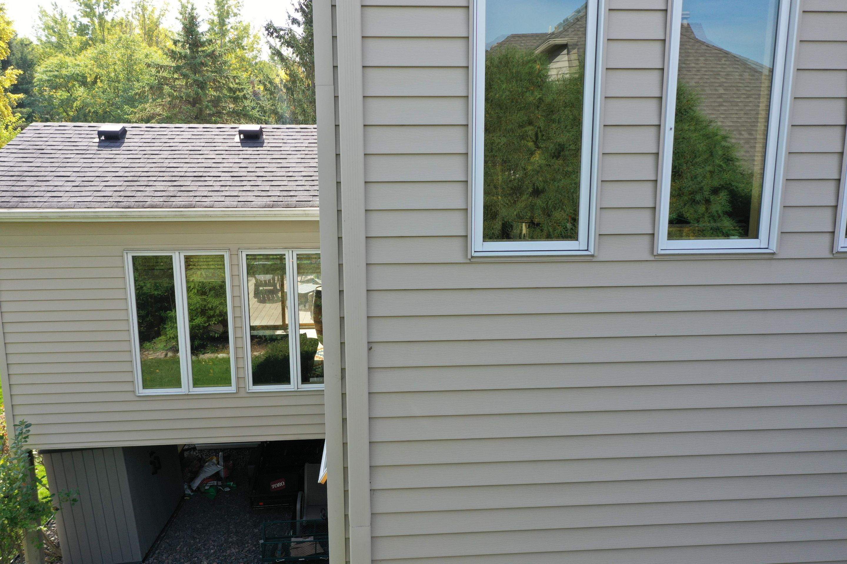 Residential Roofing Installation using Certainteed Landmark Moire Black by MODERN EXTERIOR SYSTEMS