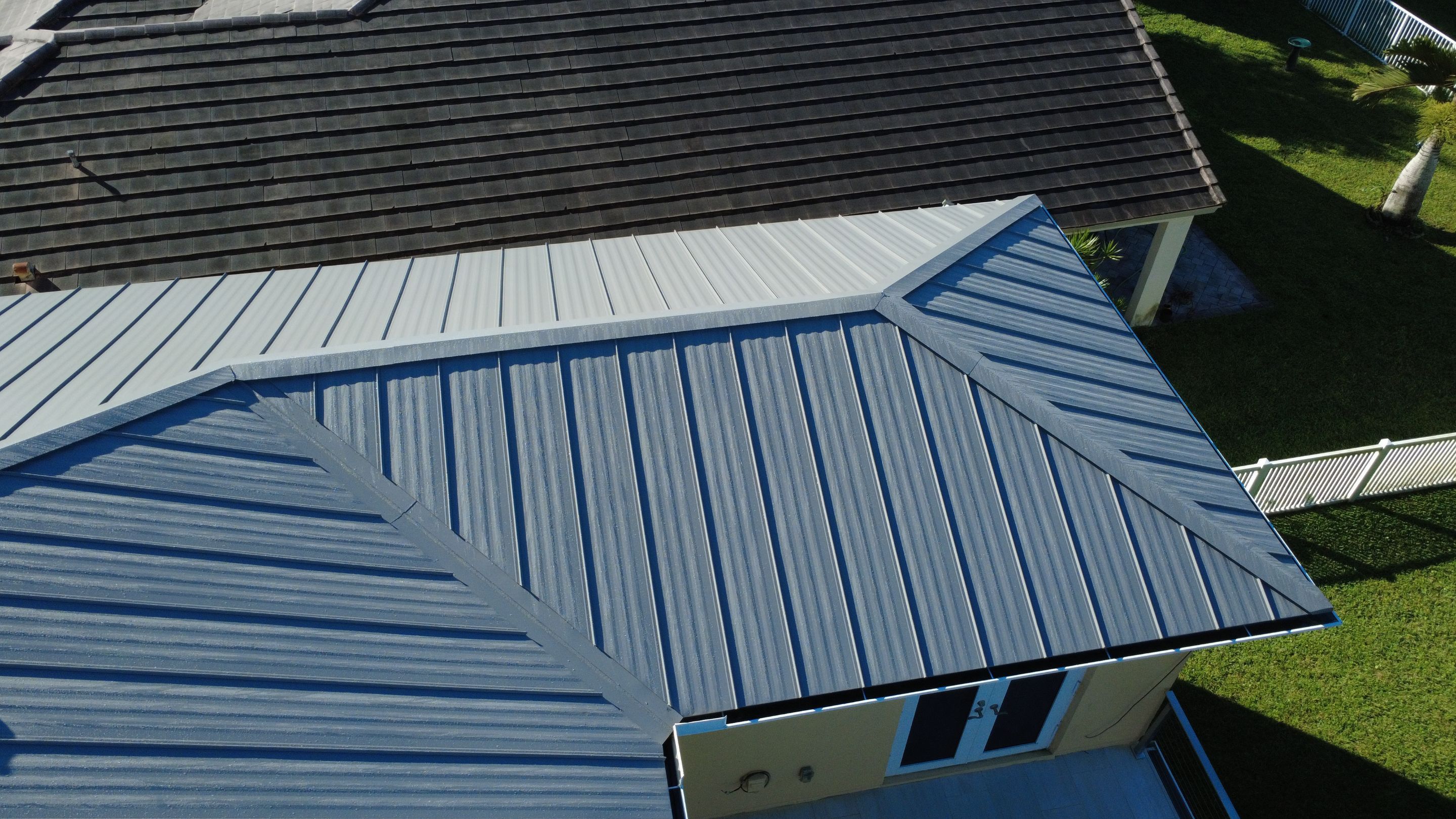 Residential Roofing Installation using 1" Nail strip metal roof by BLUES BROTHERS ROOFING