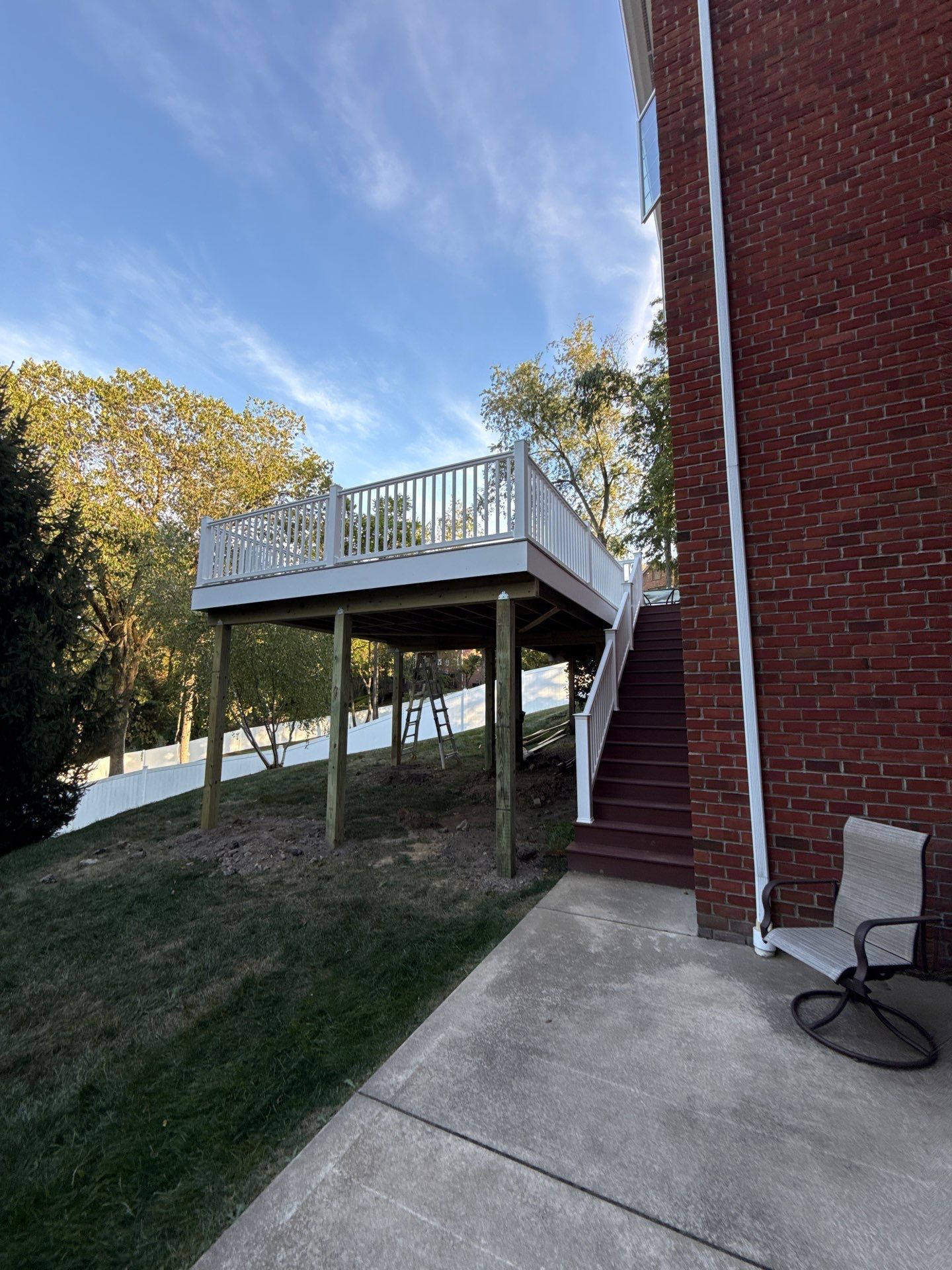 Deck extension  by Cousins Roofing Siding & Decks
