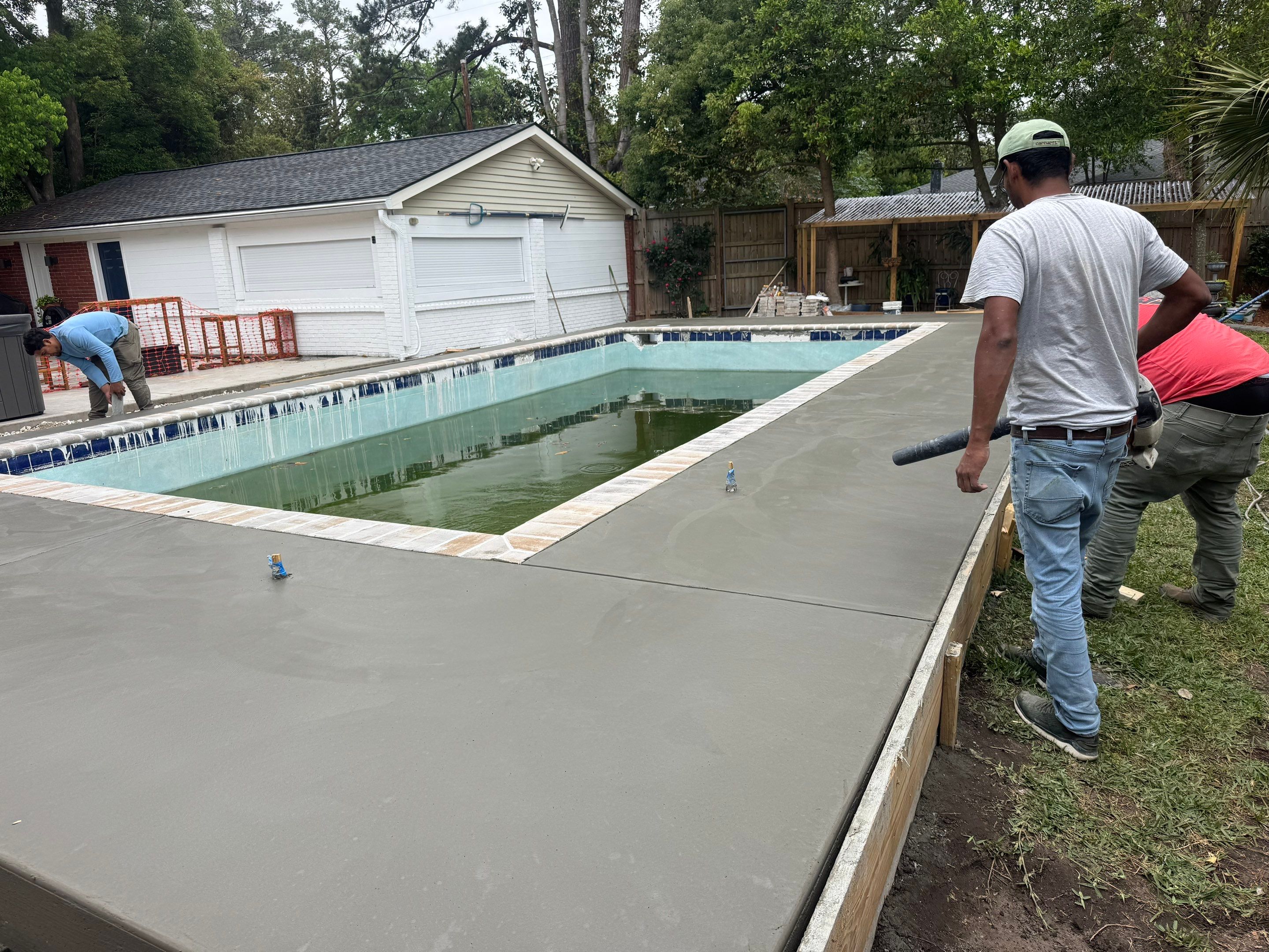 Savannah Pool Deck Replacement with Textured Concrete and Brick Coping by Lowcountry Scapes, LLC