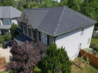 Roof Replacment - GAF Timberline HDZ Charcoal with 5” black seamless gutters 