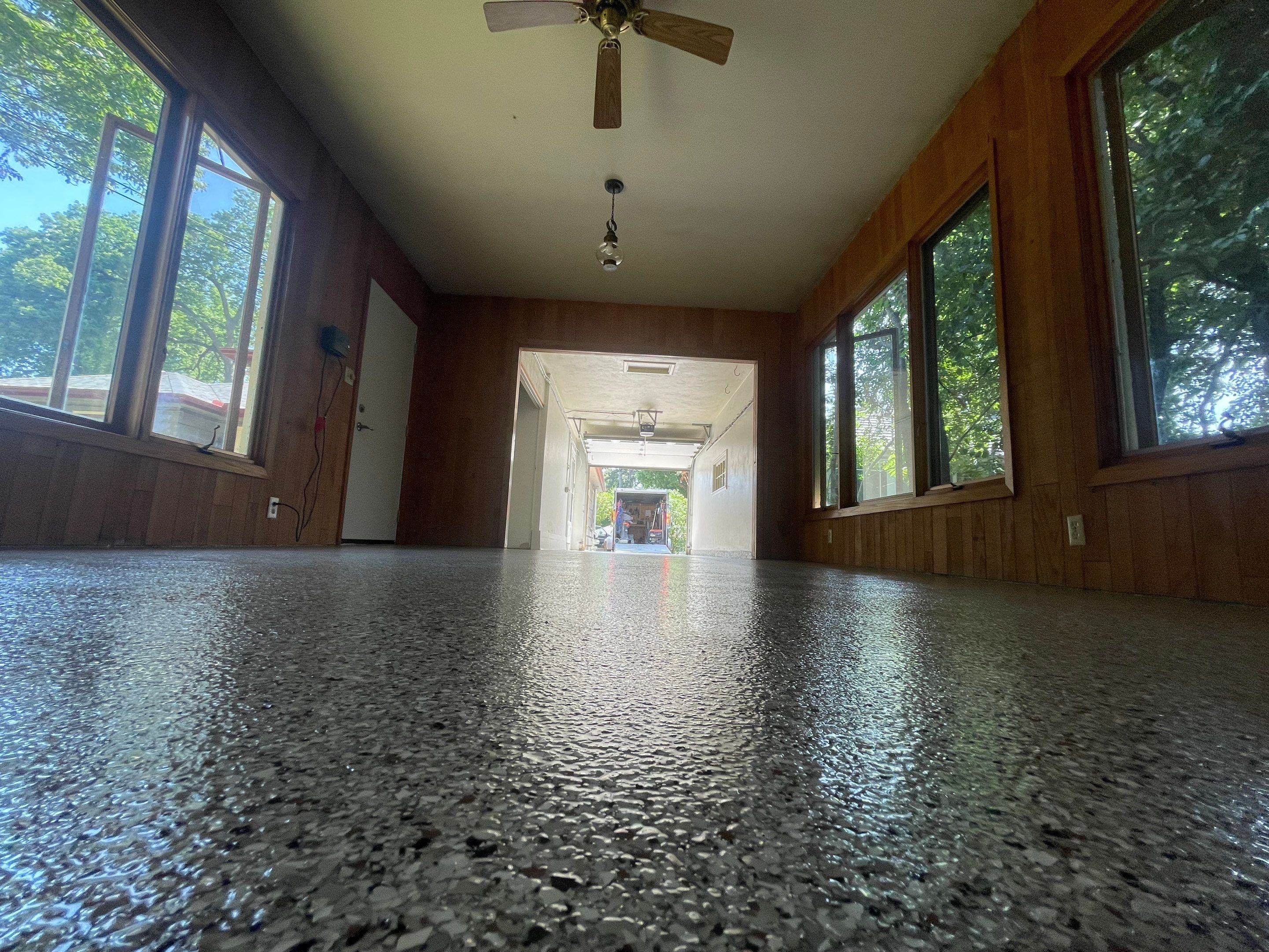 Sioux Falls Garage and Sunroom Concrete Coating with Coyote Flake by Select Painting, Coatings & Garage Cabinets