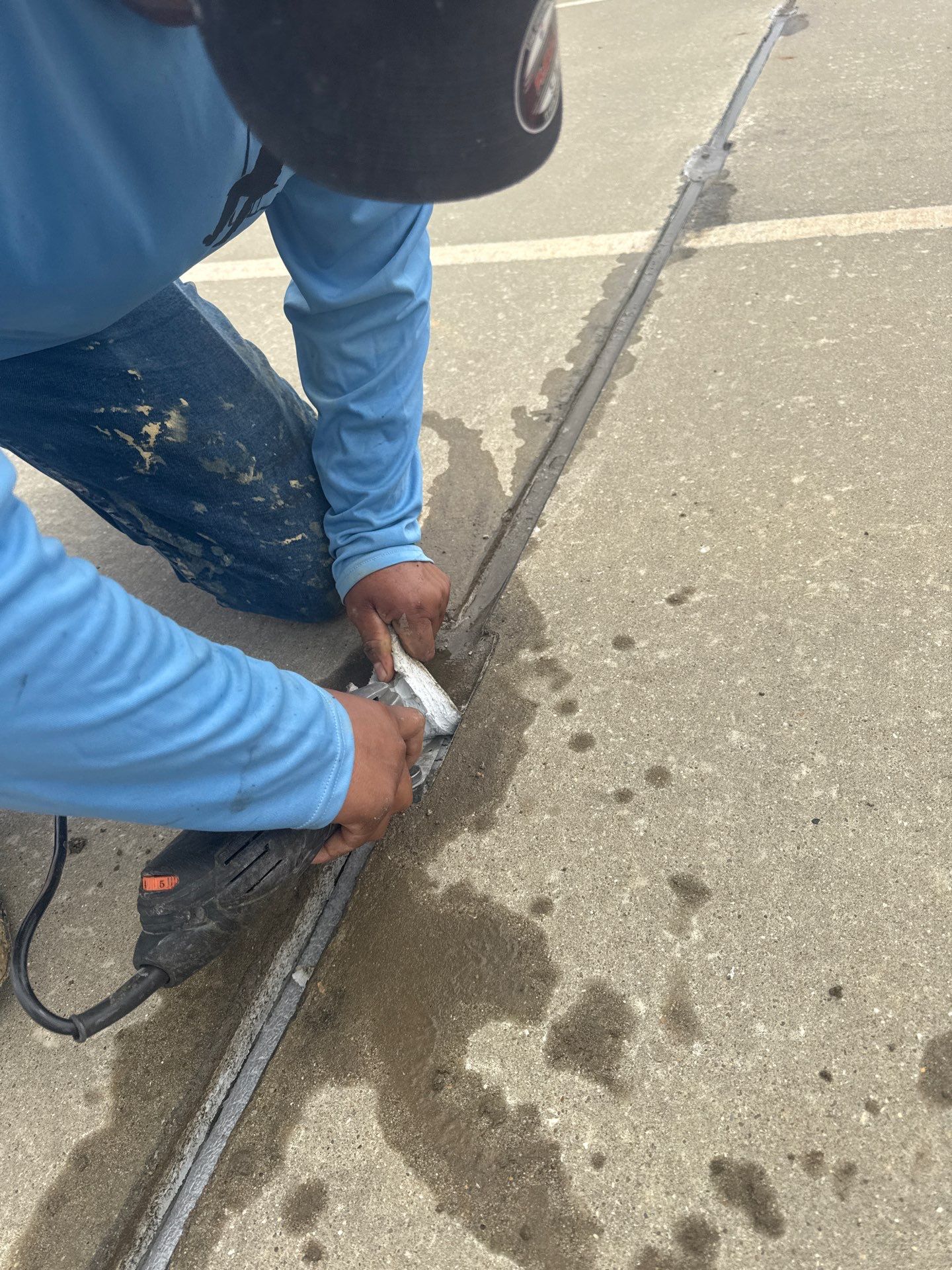 Comprehensive Concrete Joint and Crack Repair for Louisville Parking Garage Top Deck by Performance Waterproofing LLC