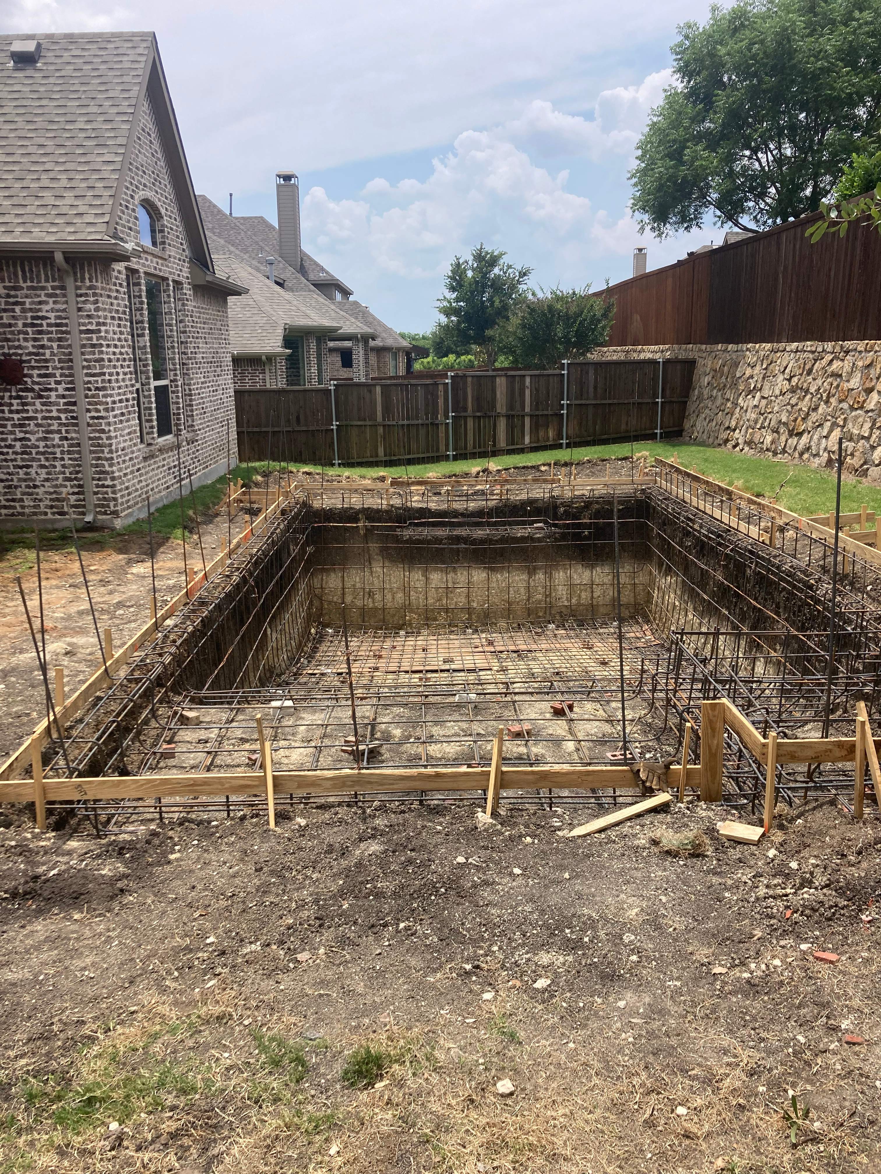 Geometric Pool with Raised Spa and Stone Decking by Pinnacle Pools and Spas - DFW