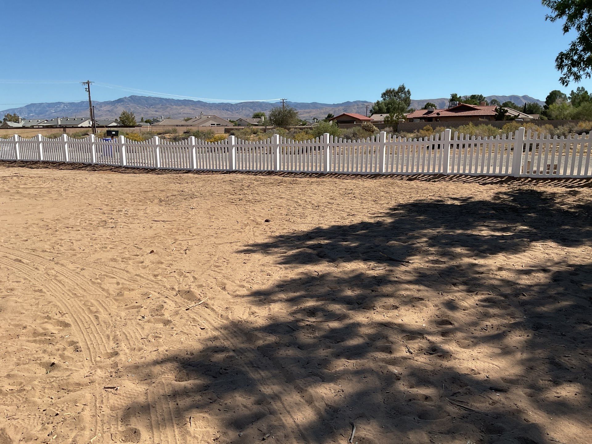 White picket fence  by Fence Guys Inc. 