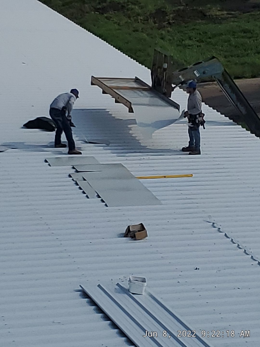 Commercial Roofing Installation using Aluminum Roofing panels by Hostetler Roofing