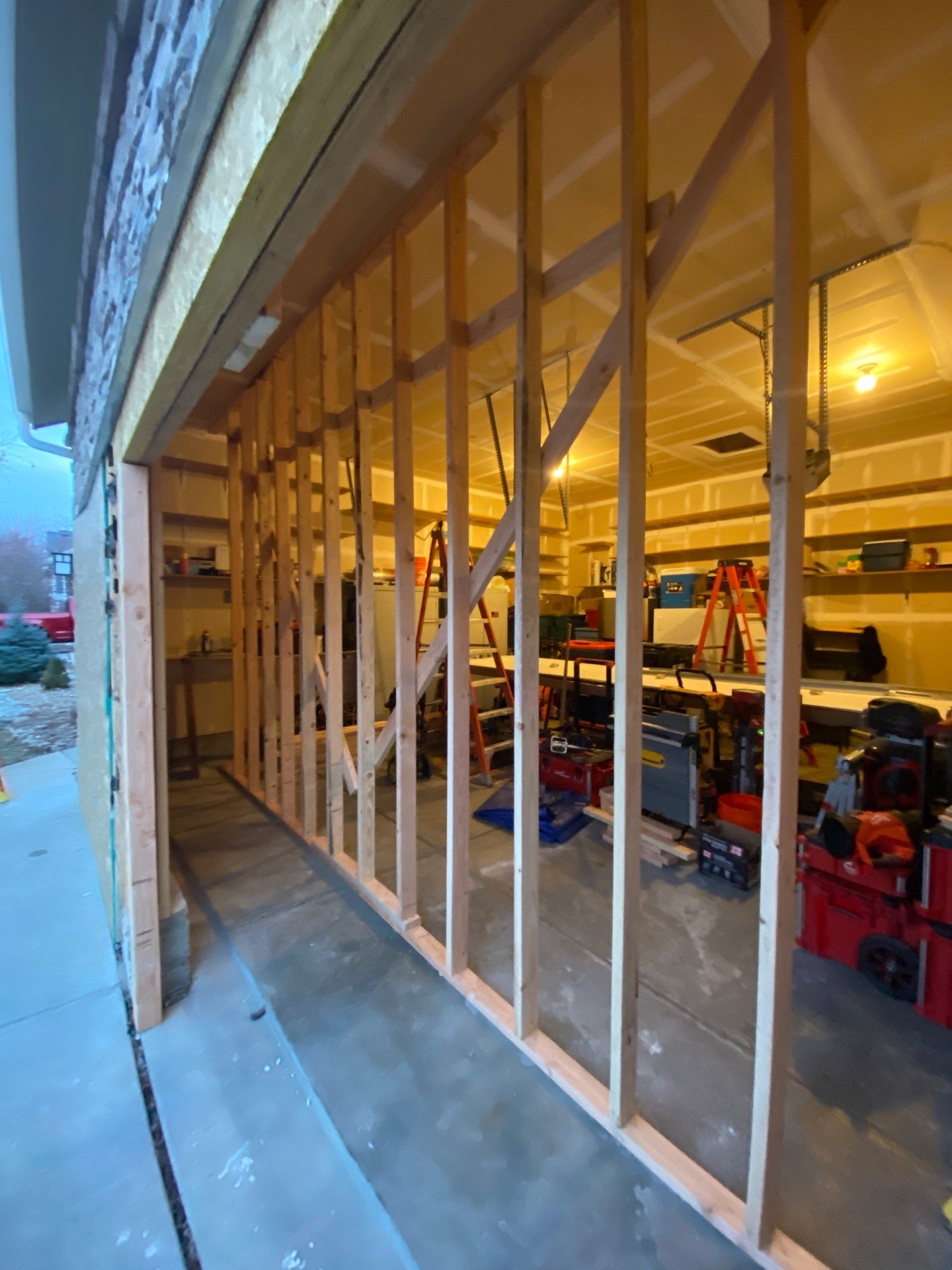 Garage door conversion by David & Goliath Contracting 